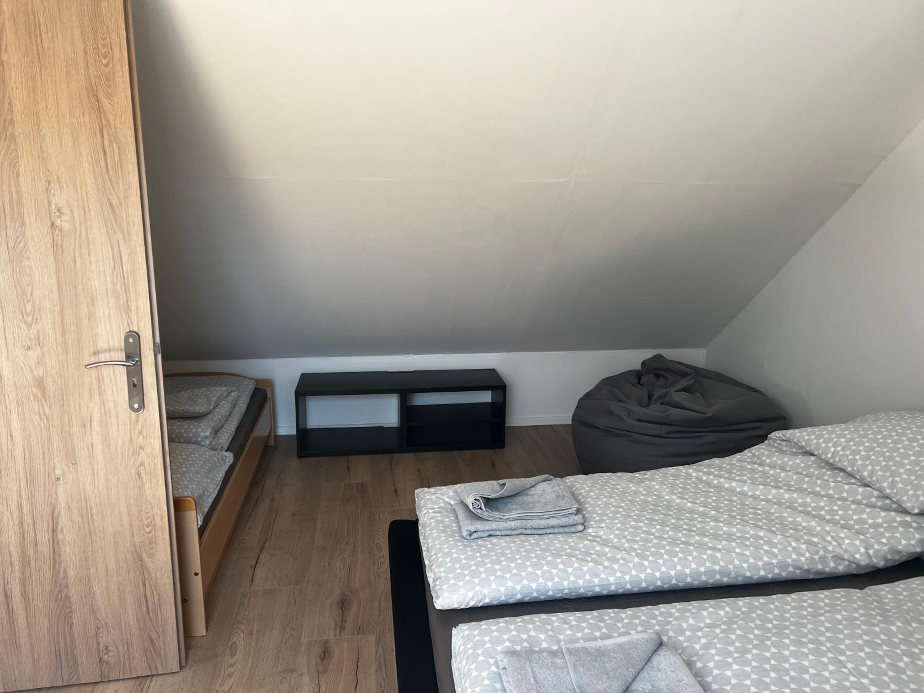 Three-Bedroom House - Photo 25