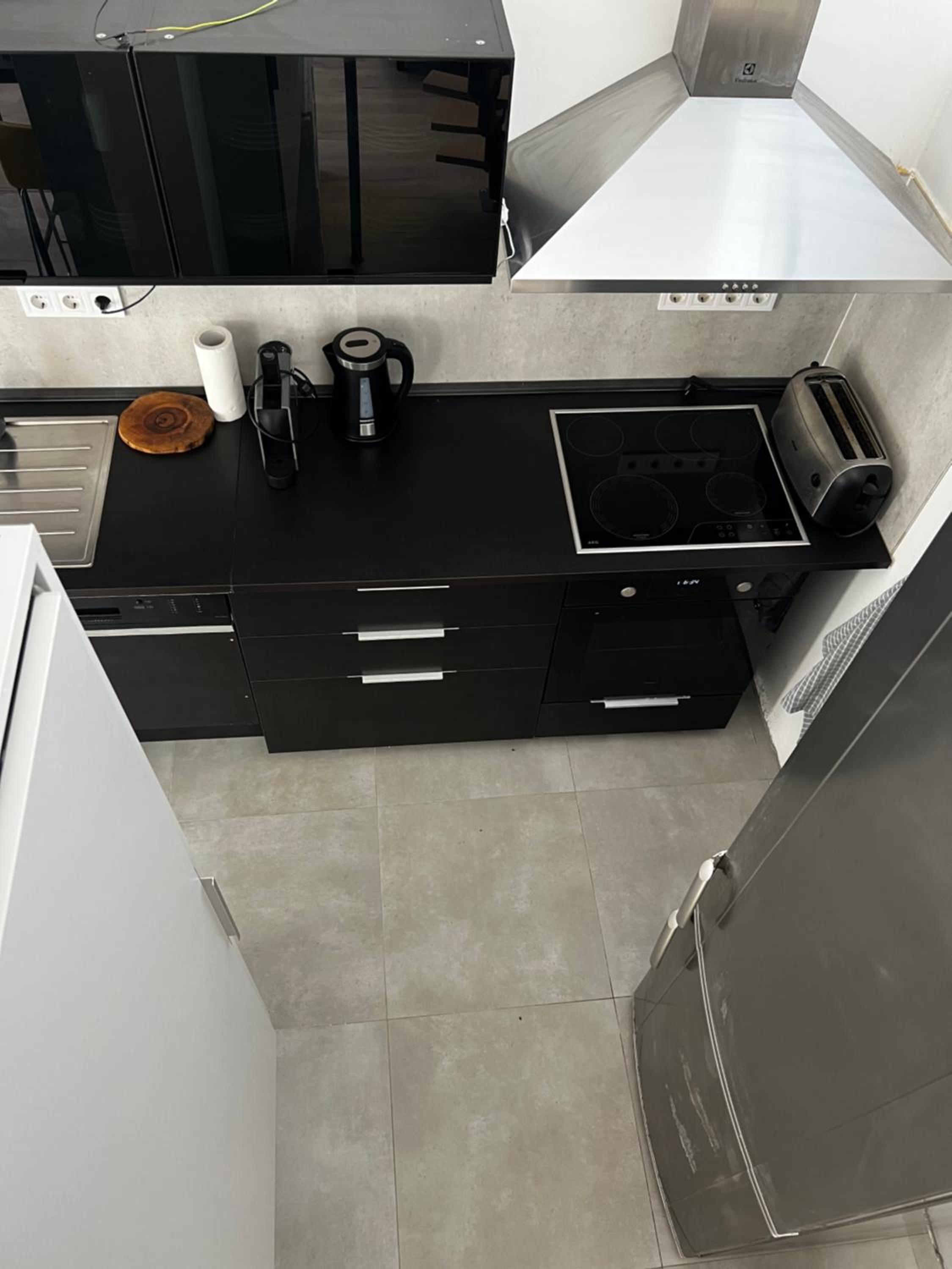 Three-Bedroom House - Photo 27