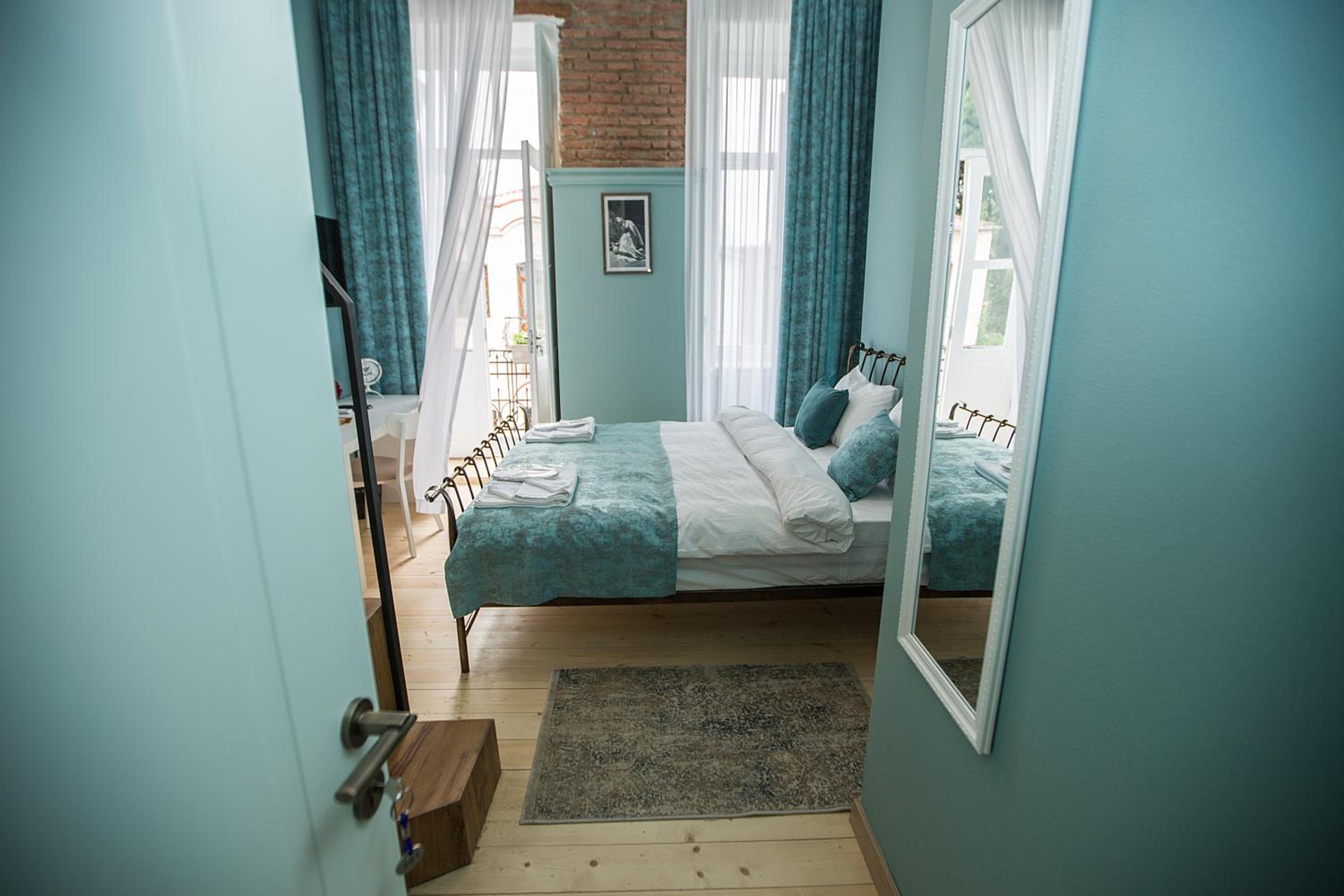 Family Room with Balcony - Photo 1
