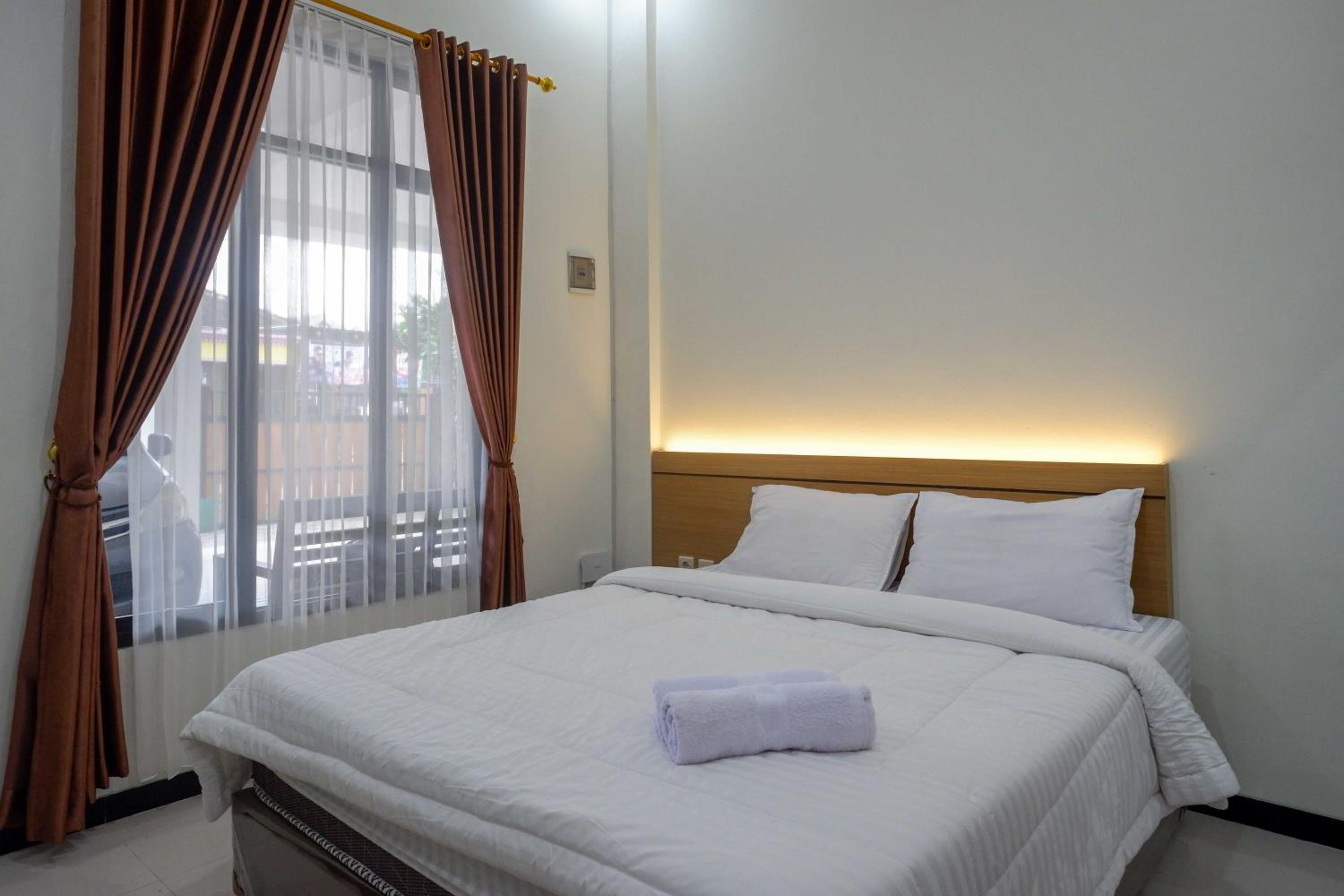 Deluxe Room - Photo 7