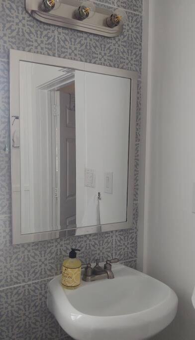 Three-Bedroom House - Photo 18