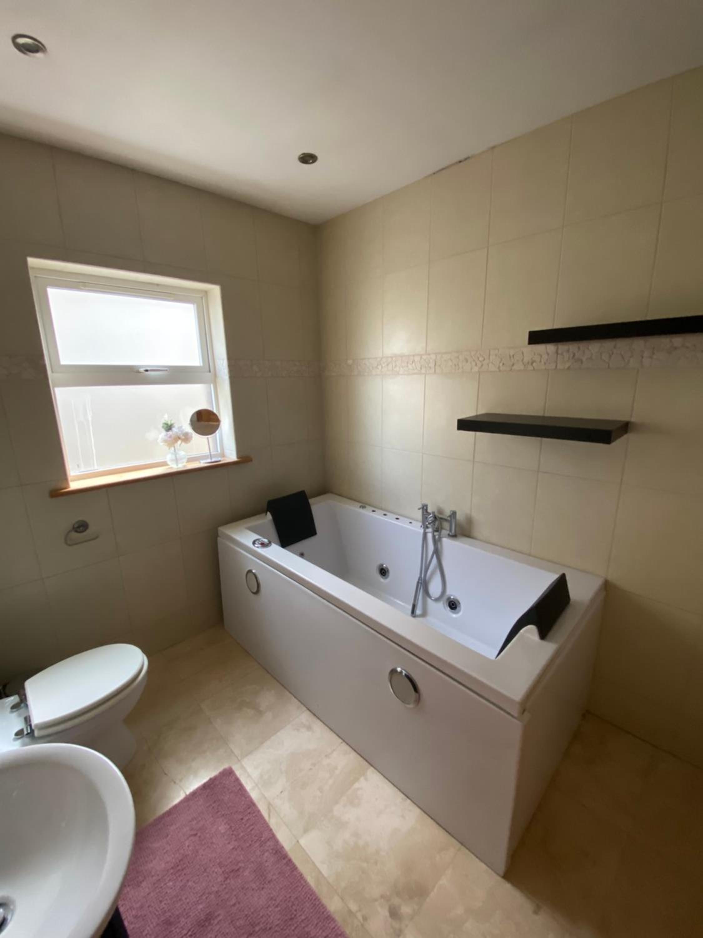 Three-Bedroom House photo 3