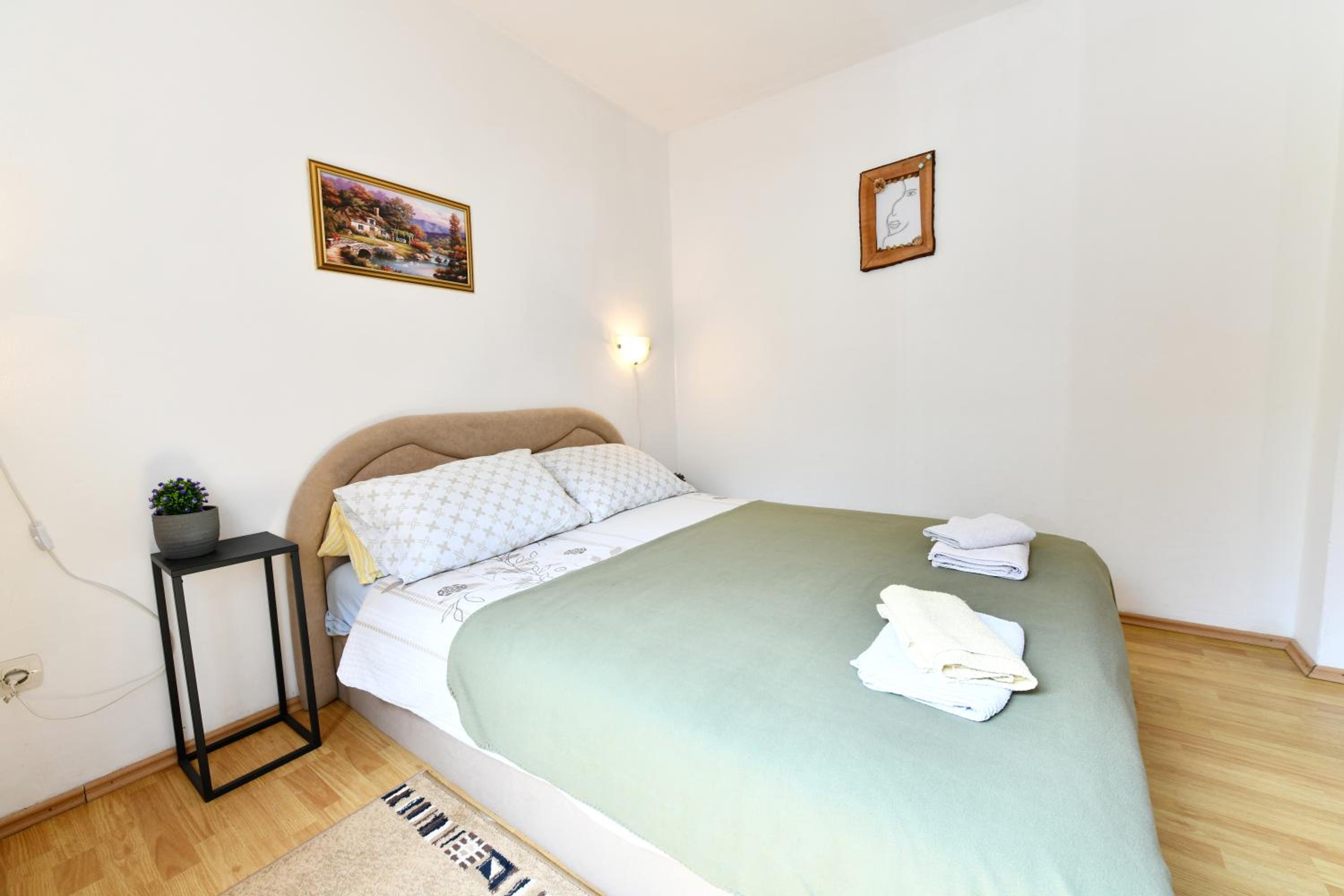 Two-Bedroom Apartment with Patio - Photo 18