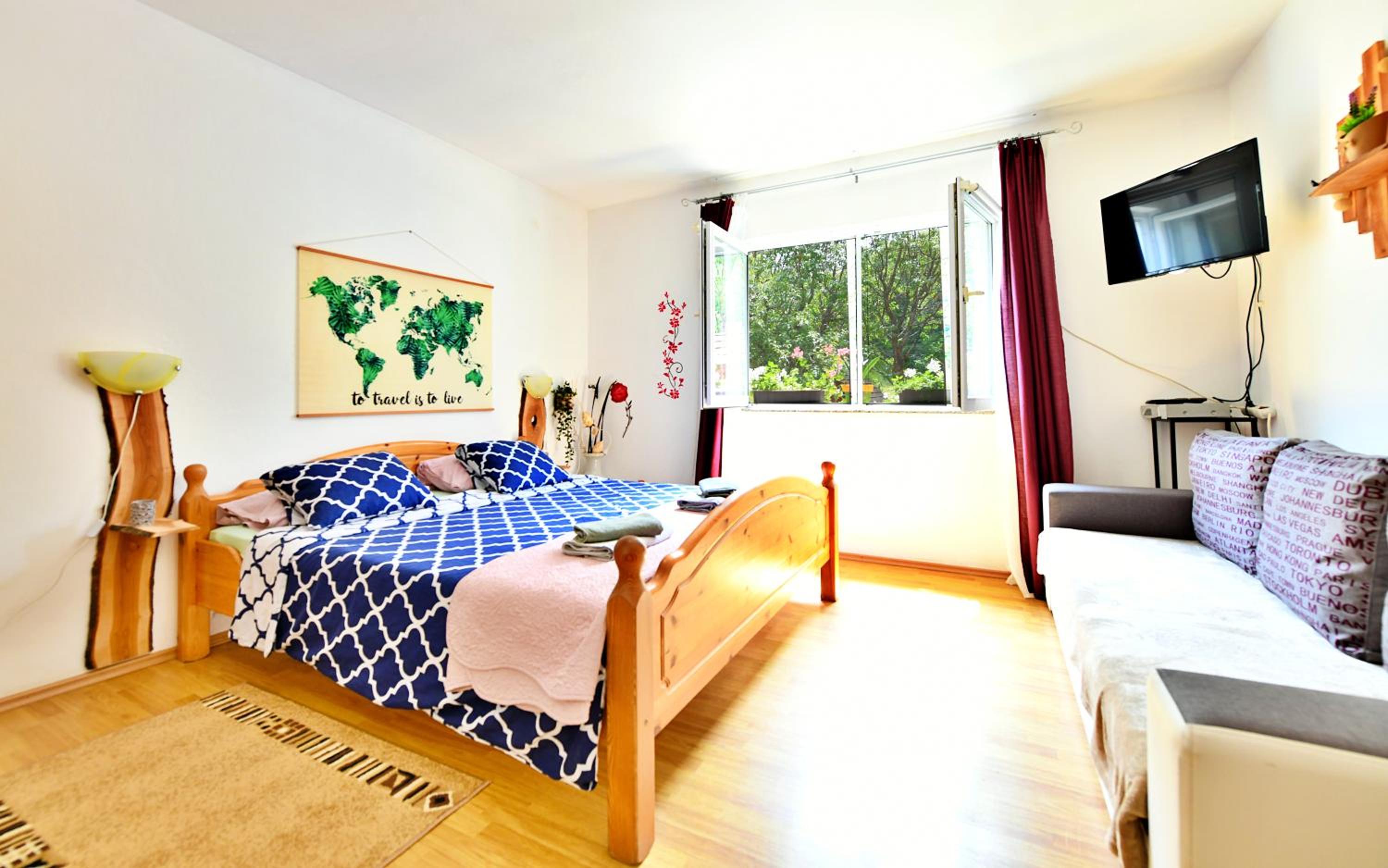 Two-Bedroom Apartment with Patio - Photo 1