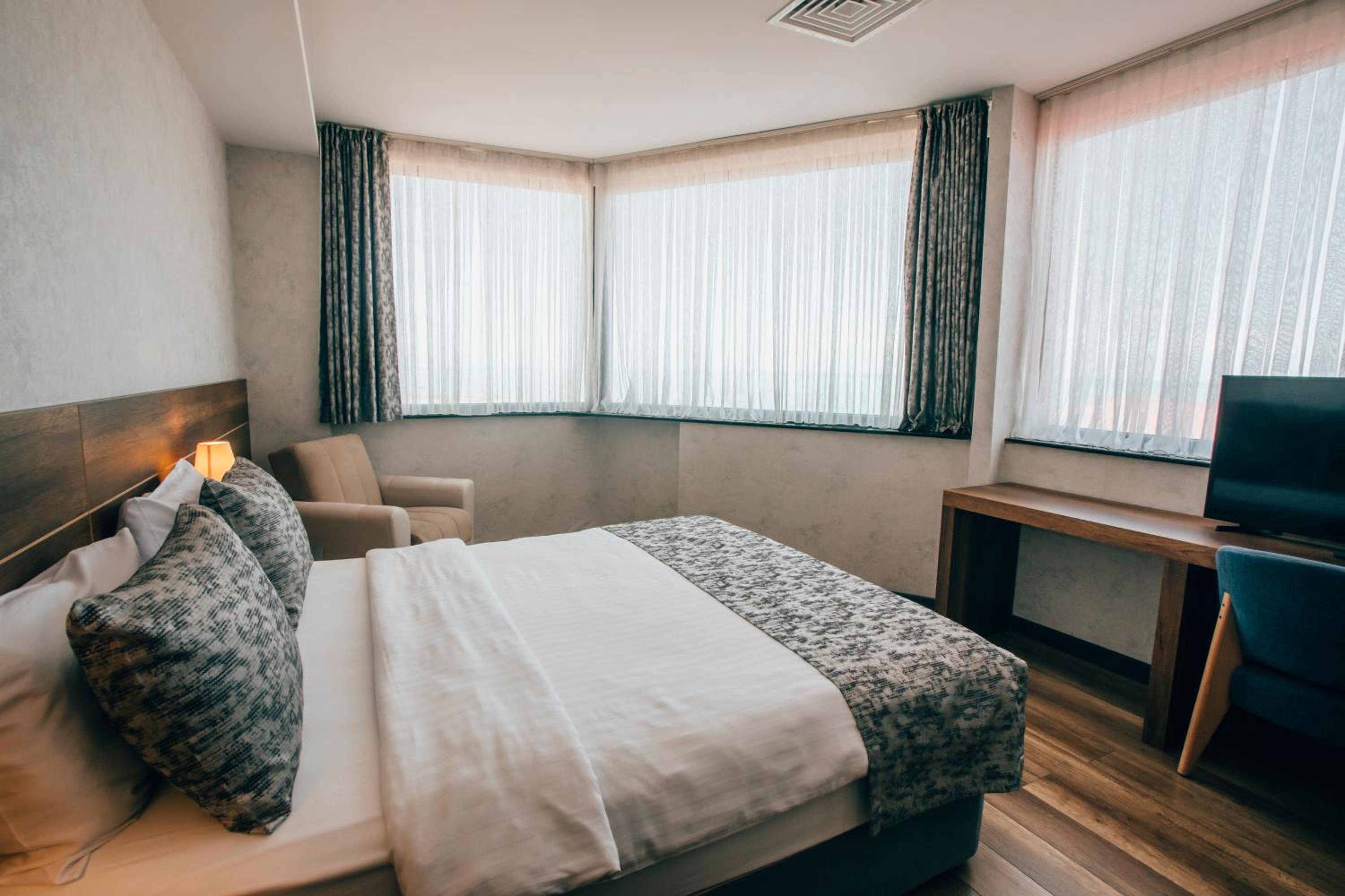 Large Two-Bedroom Suite with Balcony and Sea View