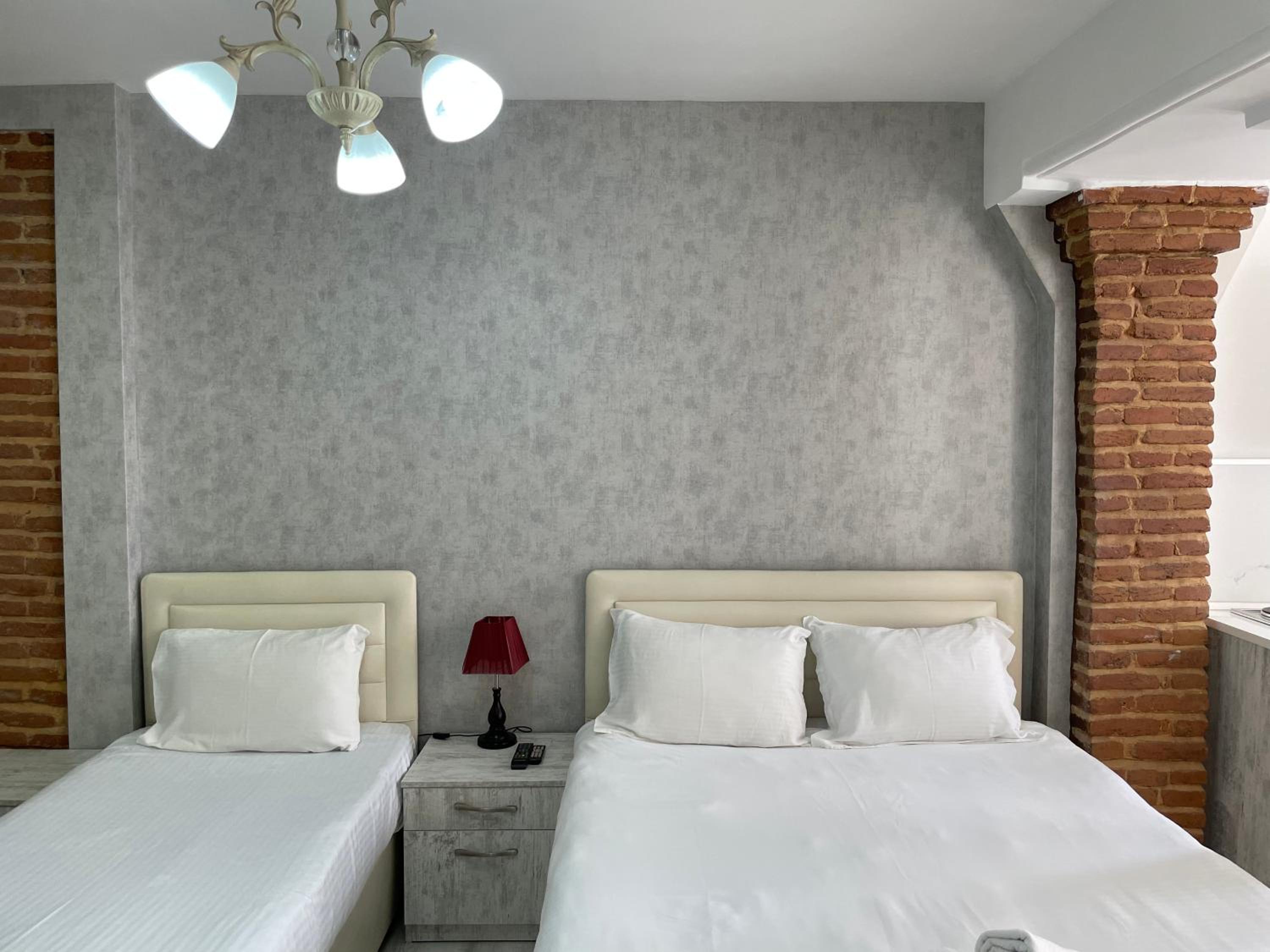 Deluxe Triple Room - Photo 1
