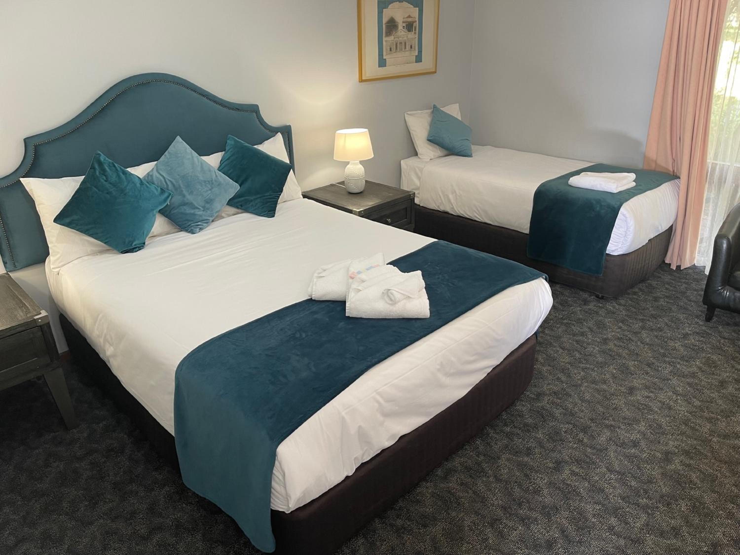 Deluxe Family Room with Spa Bath photo 1
