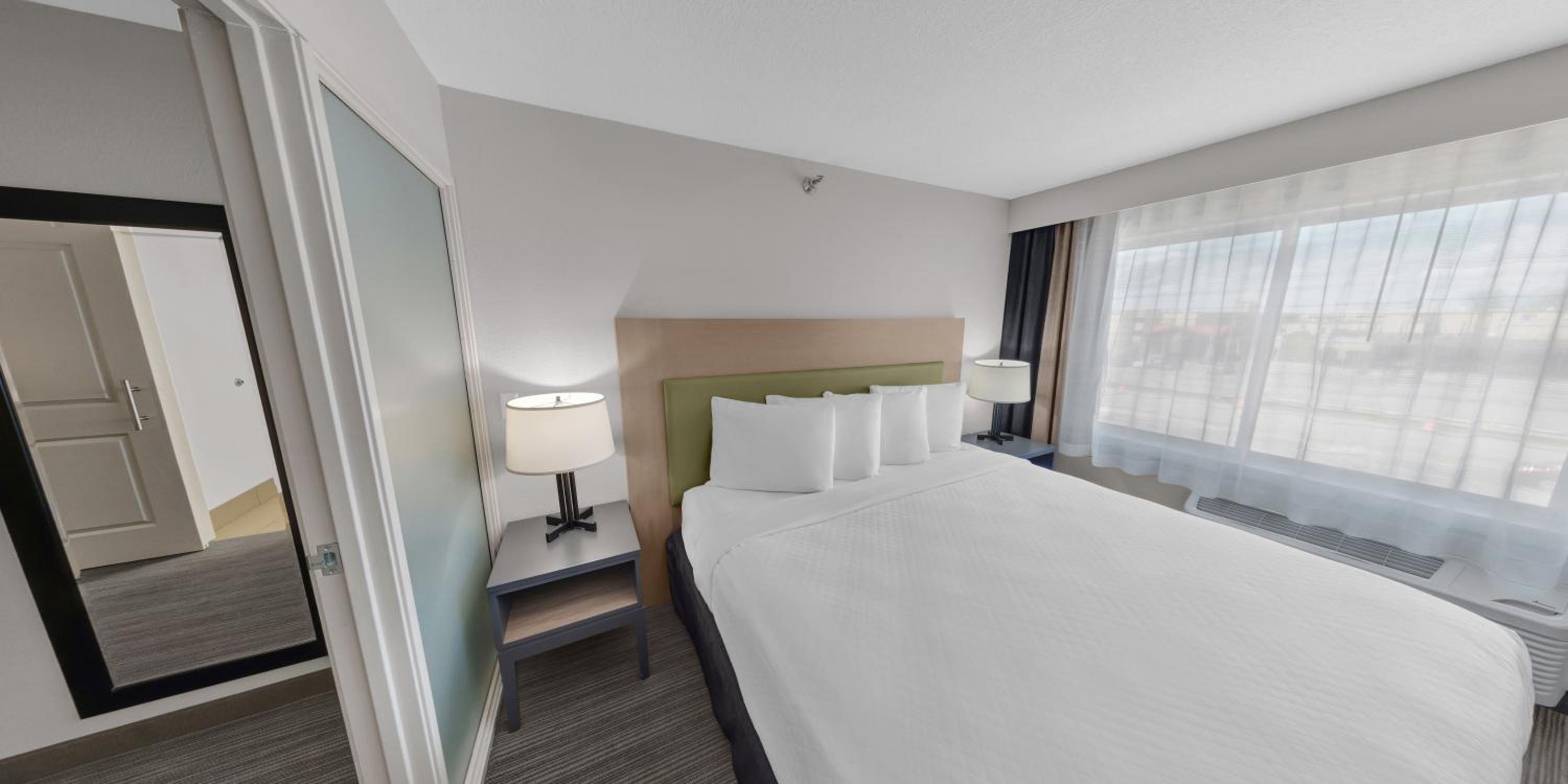 Extended Stay King Suite with Sofa Bed - Photo 1