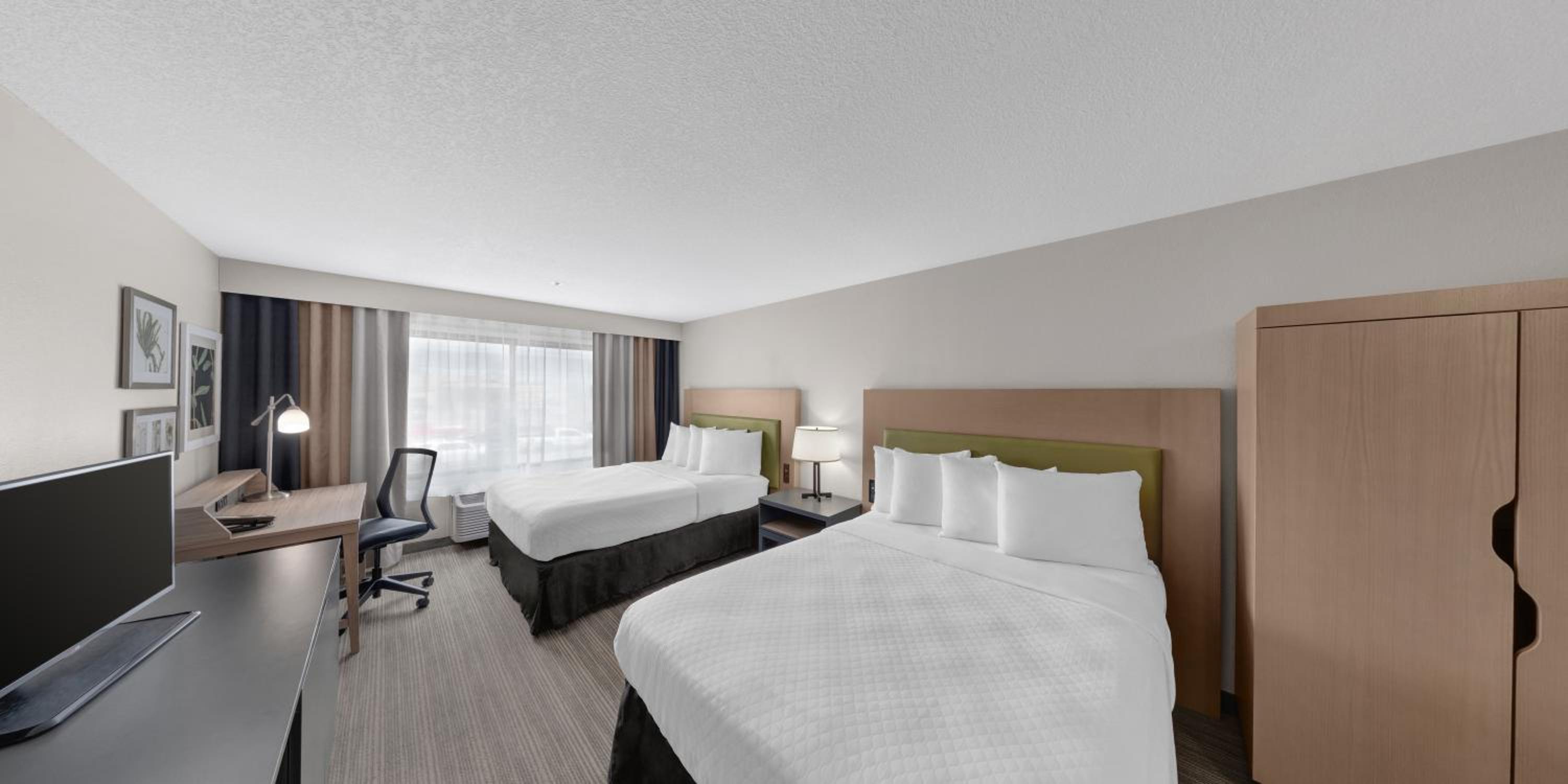 Queen Room with Two Queen Beds - Photo 1