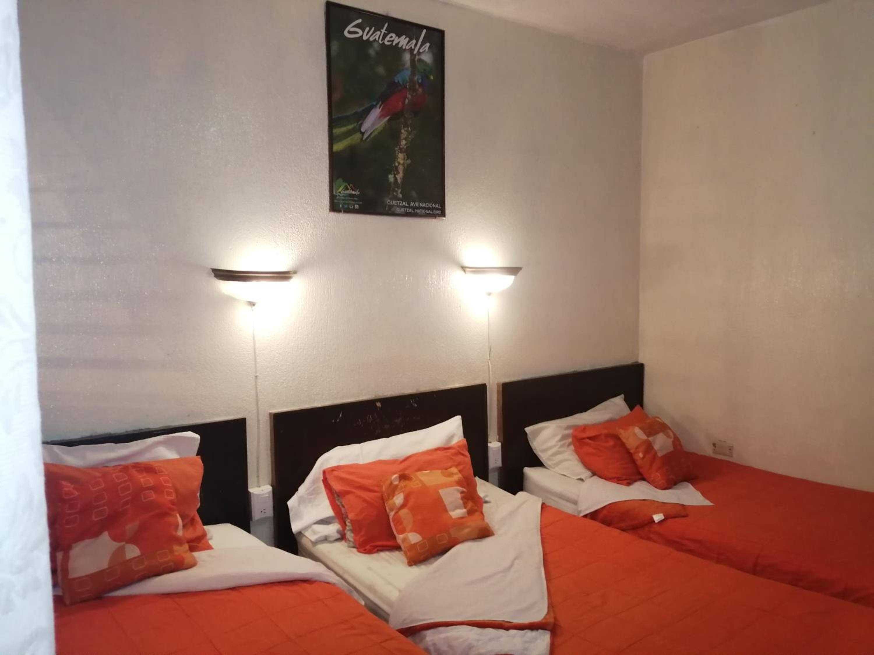 Economy Triple Room photo 2