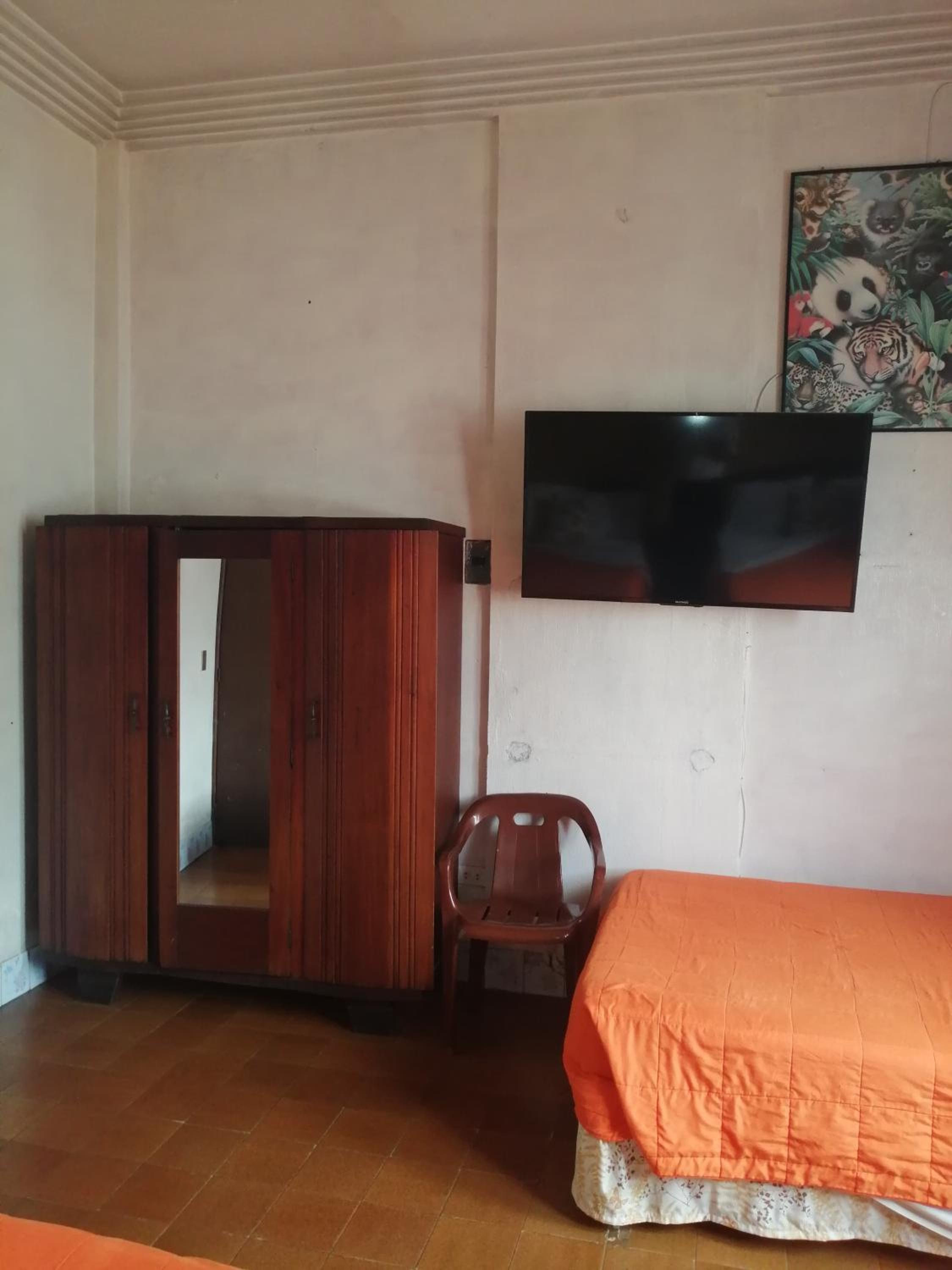 Economy Triple Room photo 3