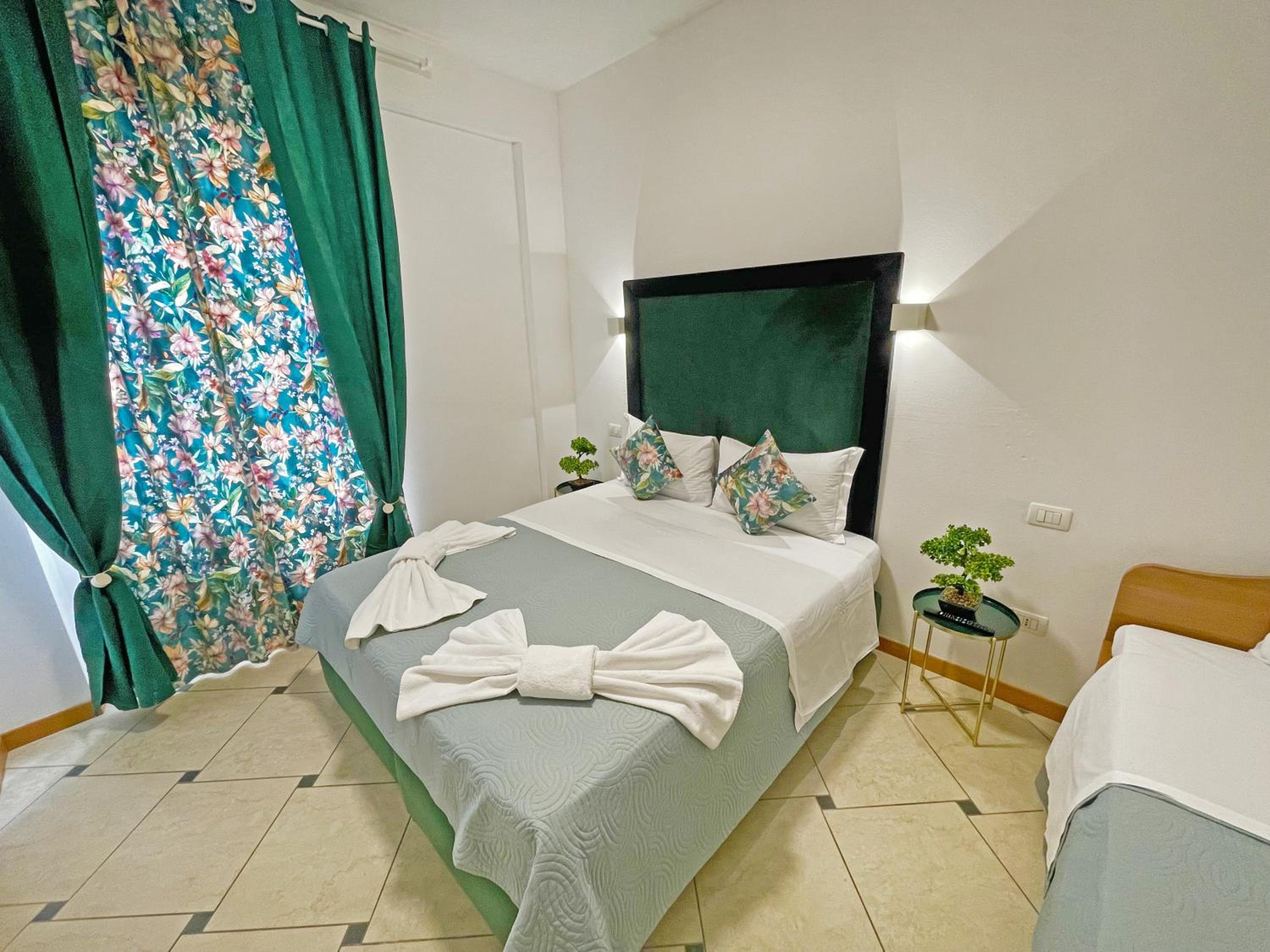 Quadruple Room with Private Bathroom - Photo 1