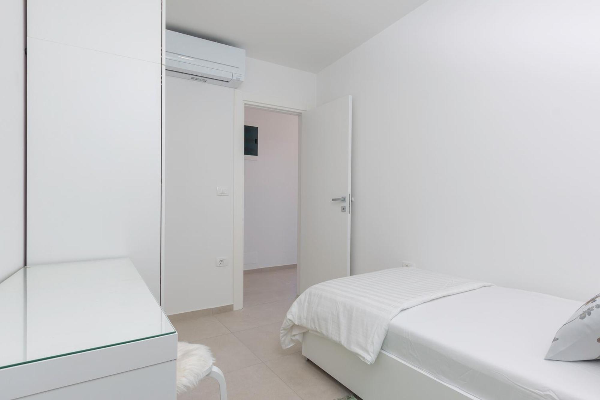Three-Bedroom Apartment photo 1
