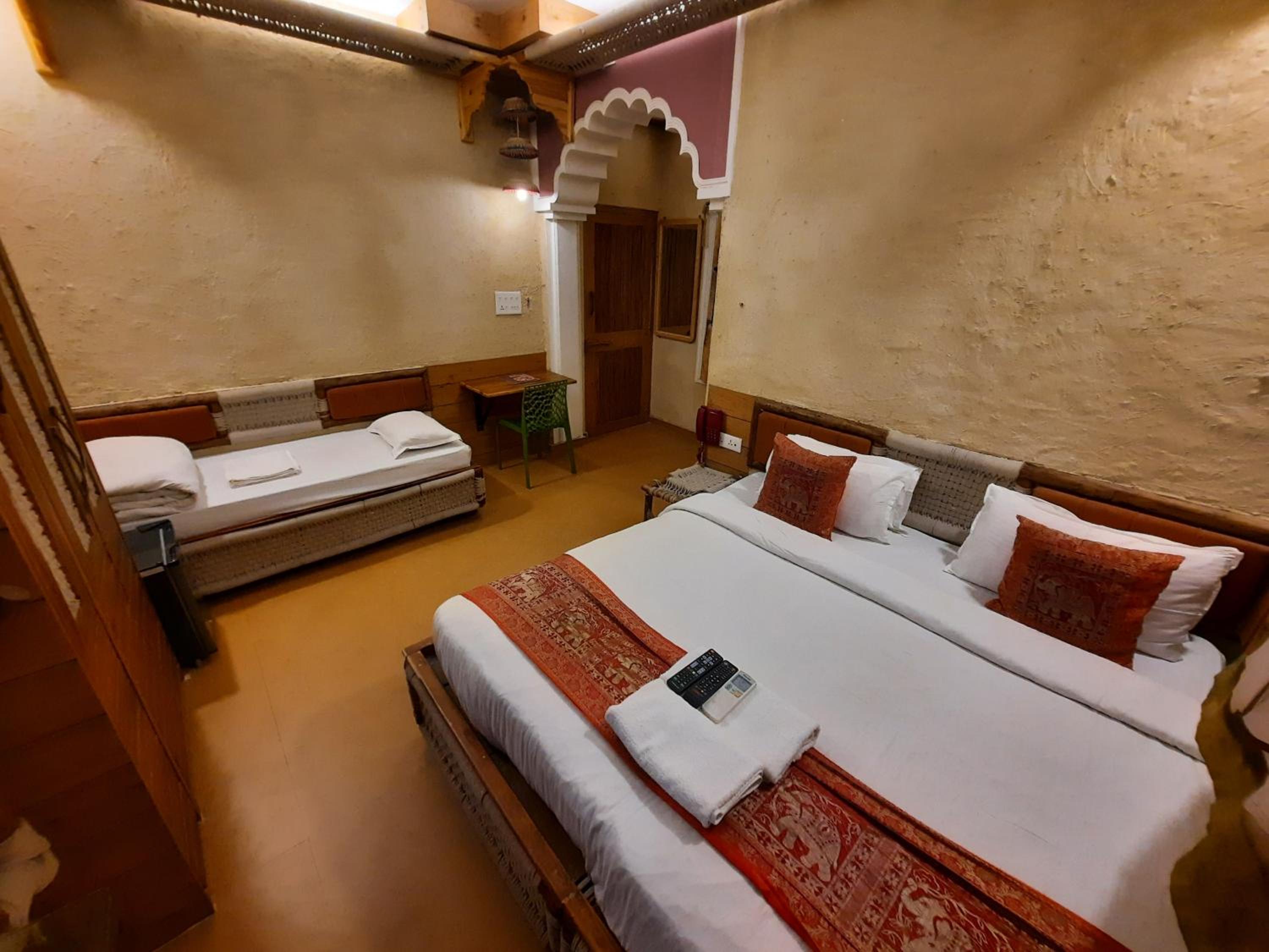 Deluxe Triple Bed Room City View - Photo 1
