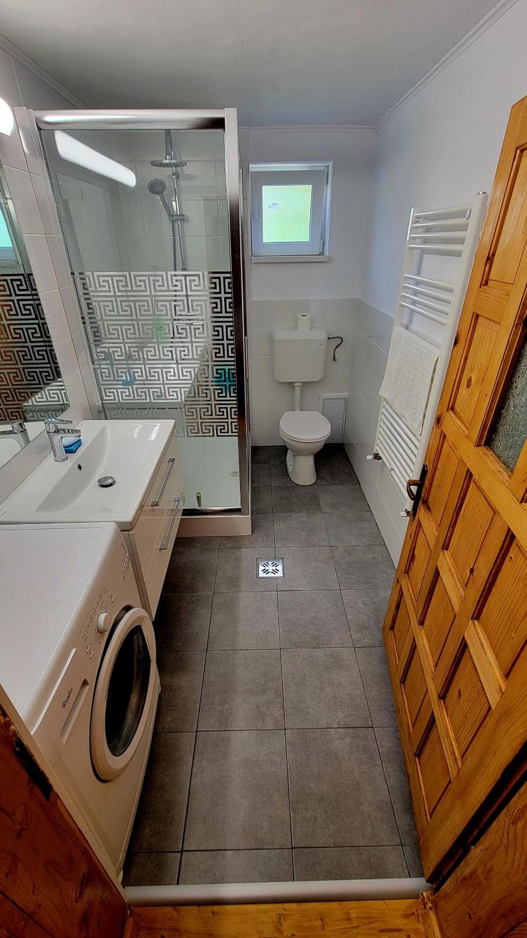 Three-Bedroom House - Photo 12