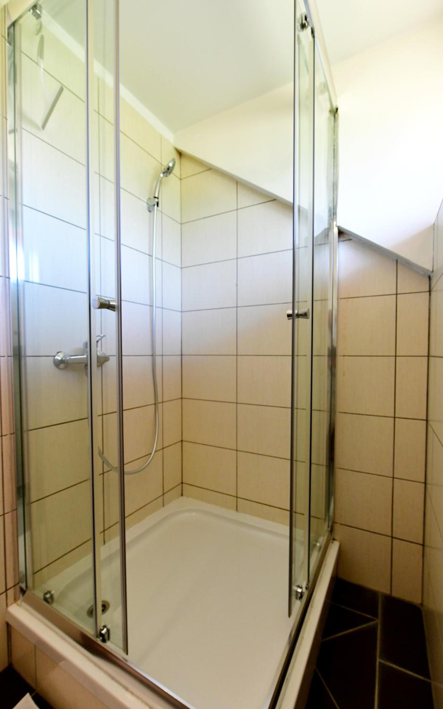 Apartment with Balcony - Photo 13