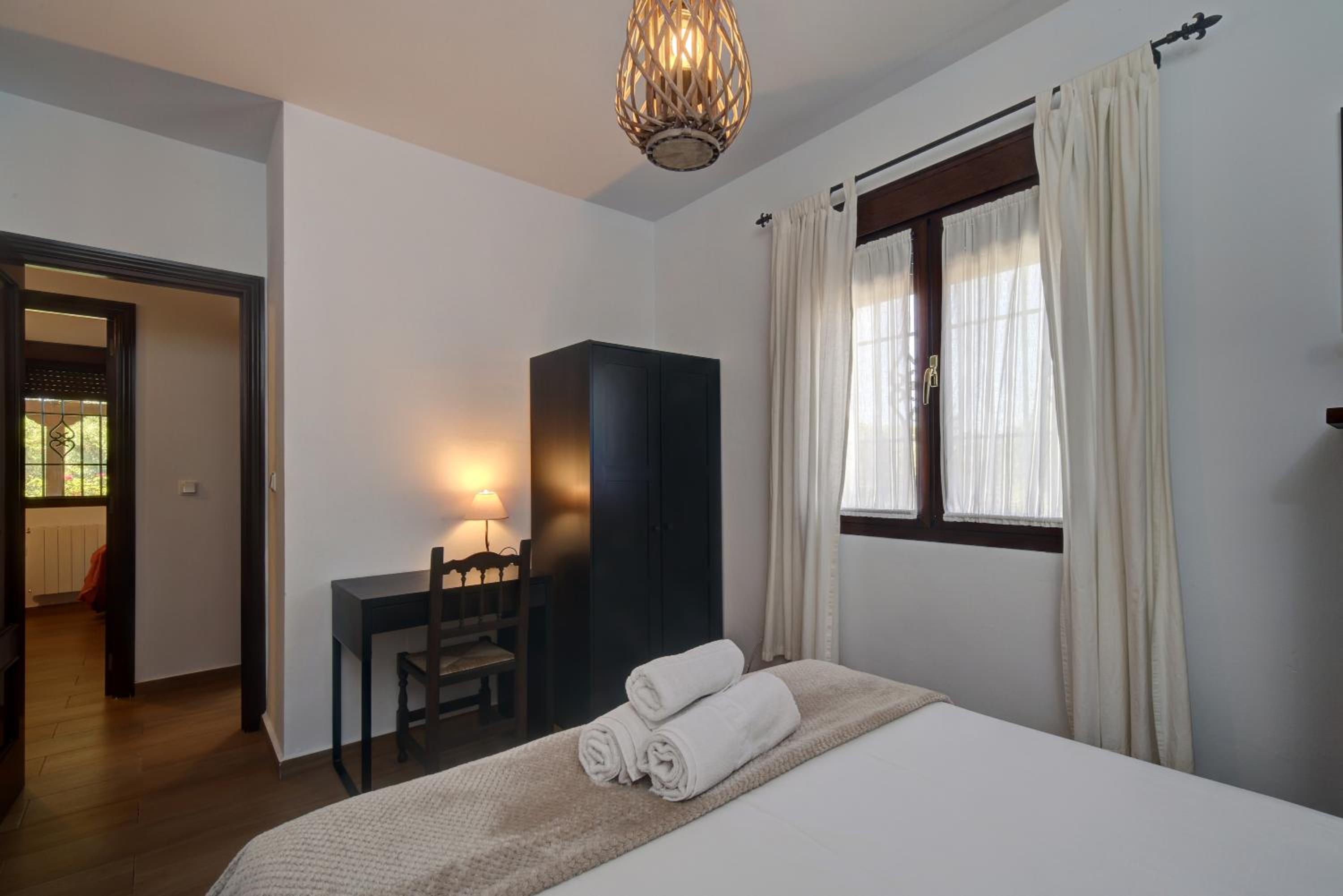 Three-Bedroom House - Photo 26