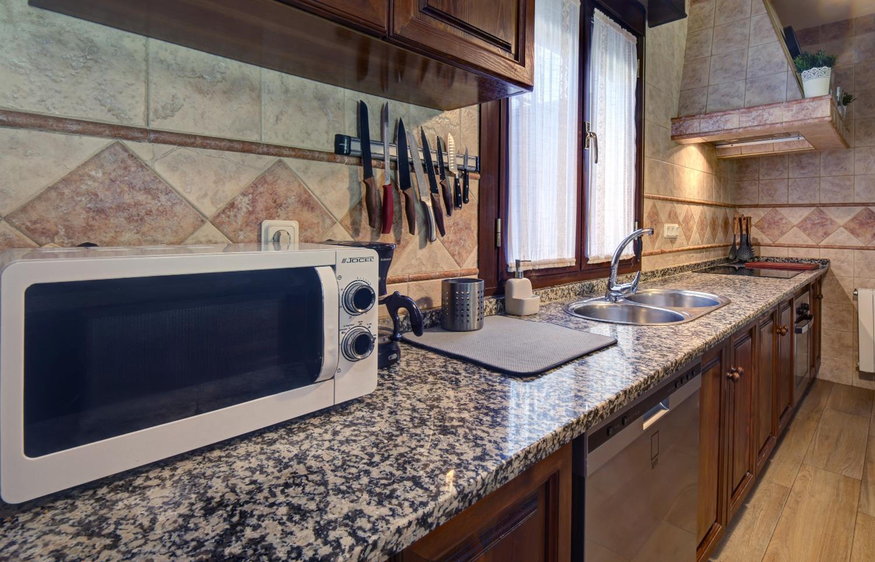Three-Bedroom House - Photo 29