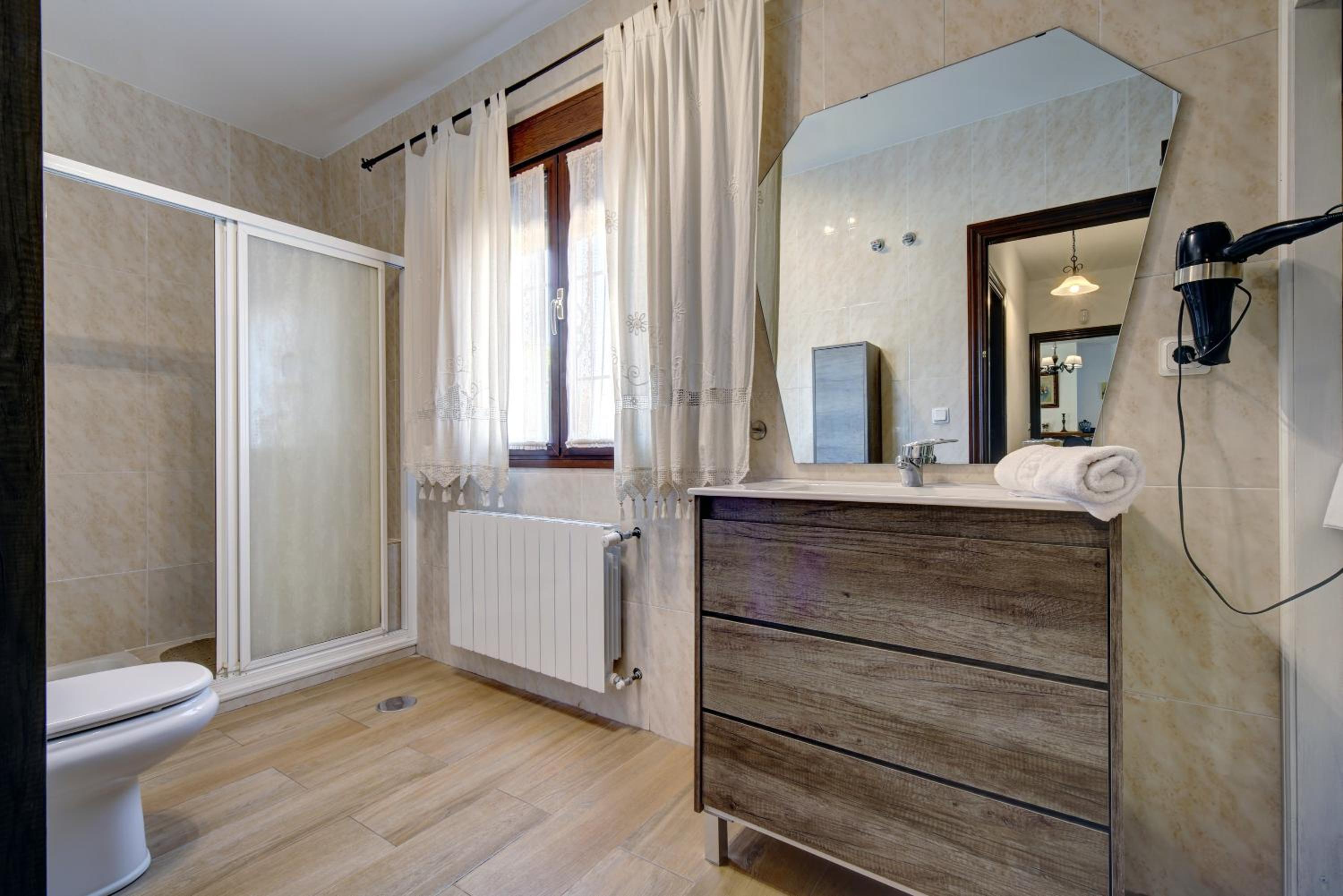 Three-Bedroom House - Photo 22