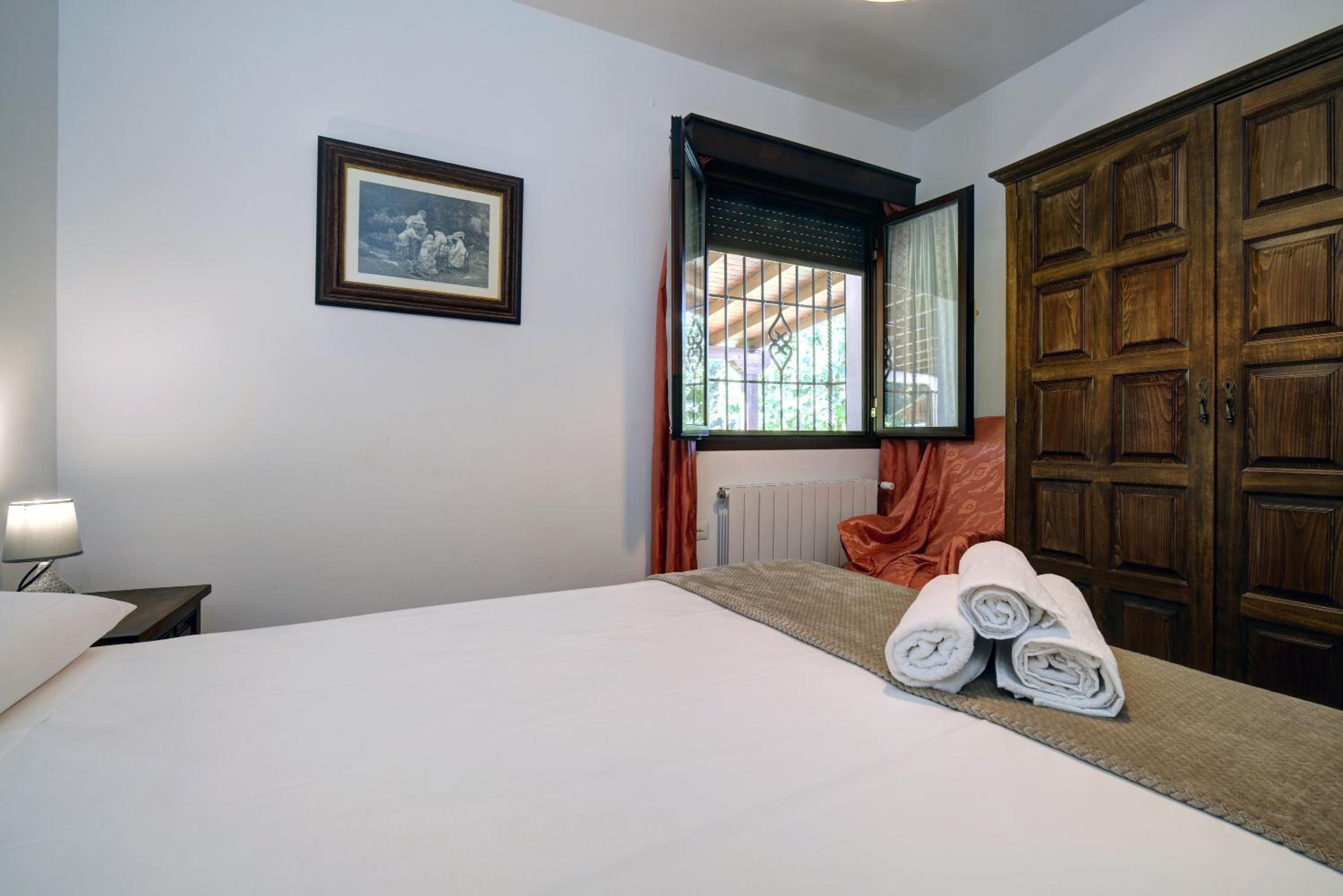 Three-Bedroom House - Photo 23