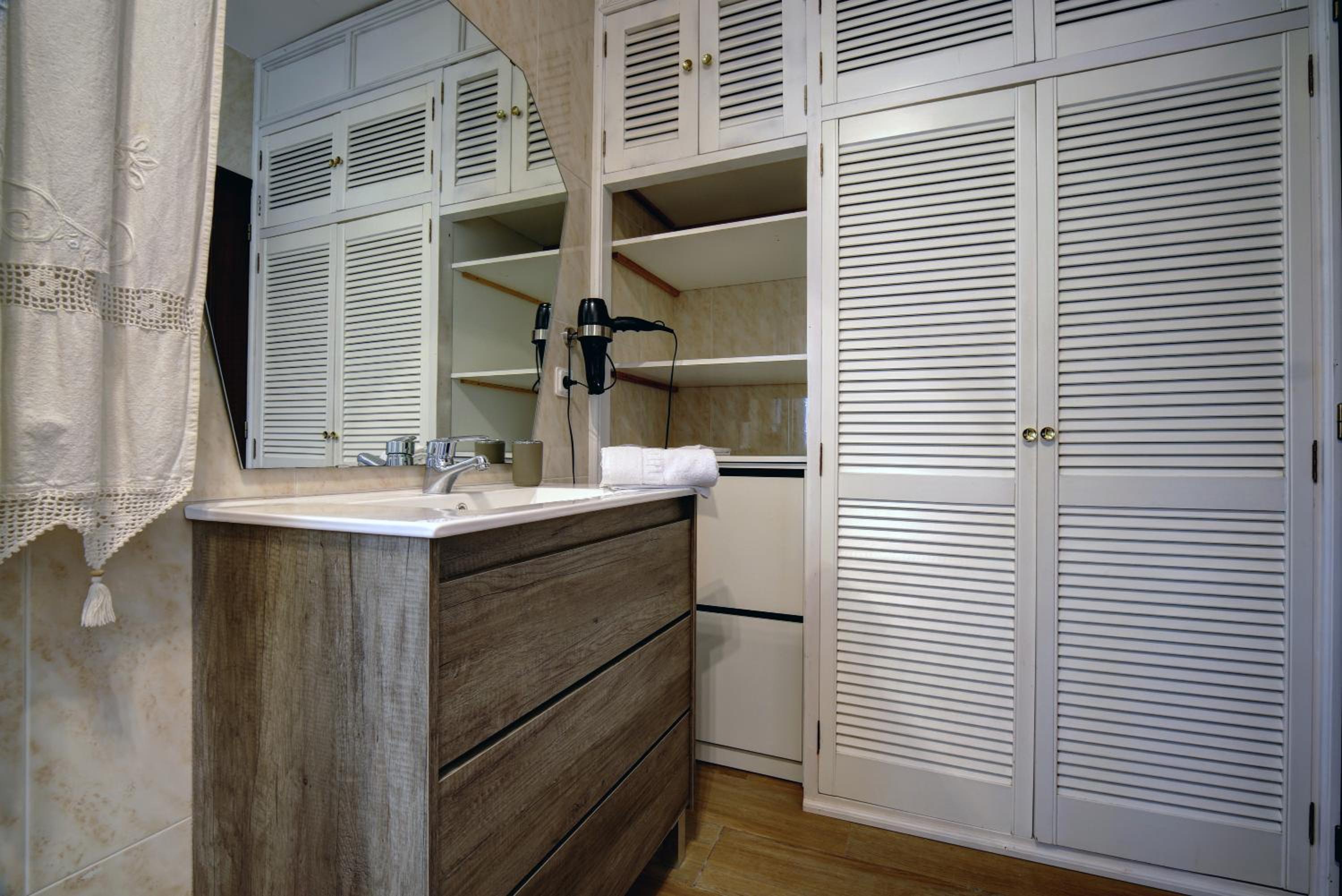 Three-Bedroom House - Photo 21