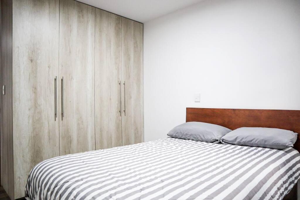 Three-Bedroom Apartment photo 2