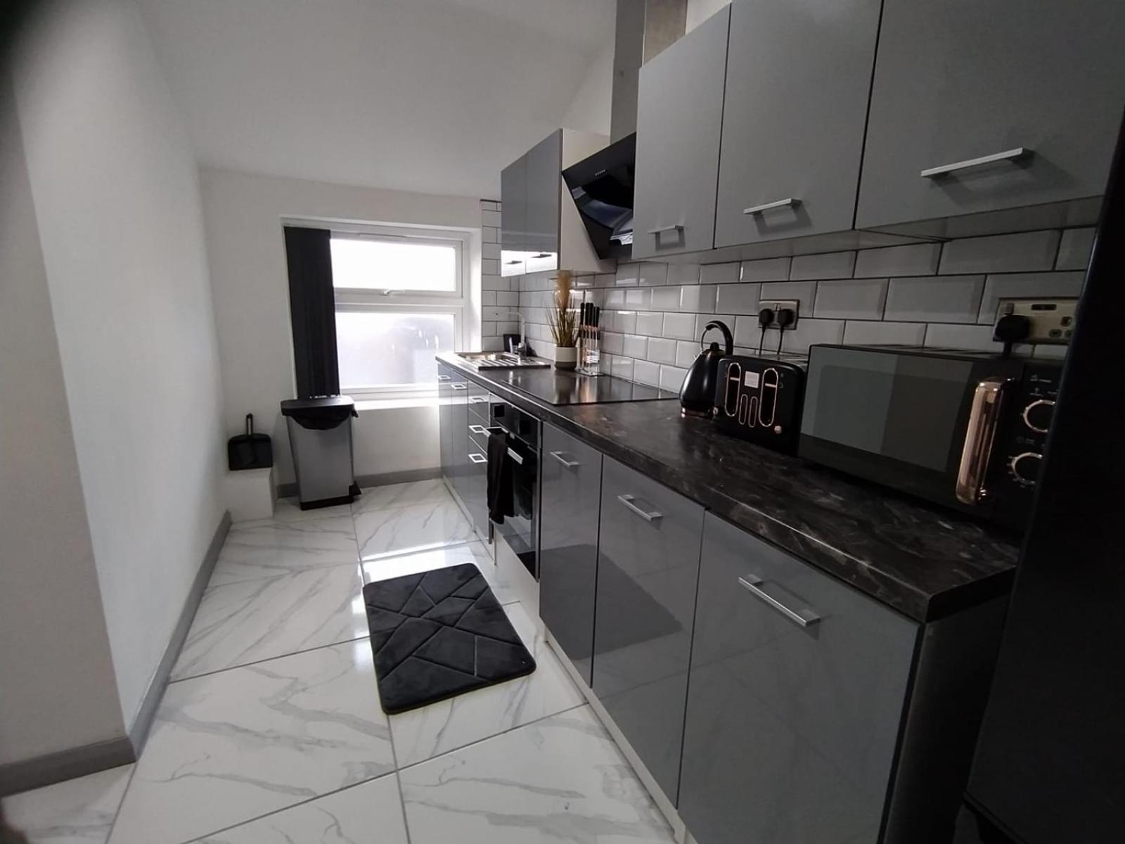 Three-Bedroom Apartment - Photo 5