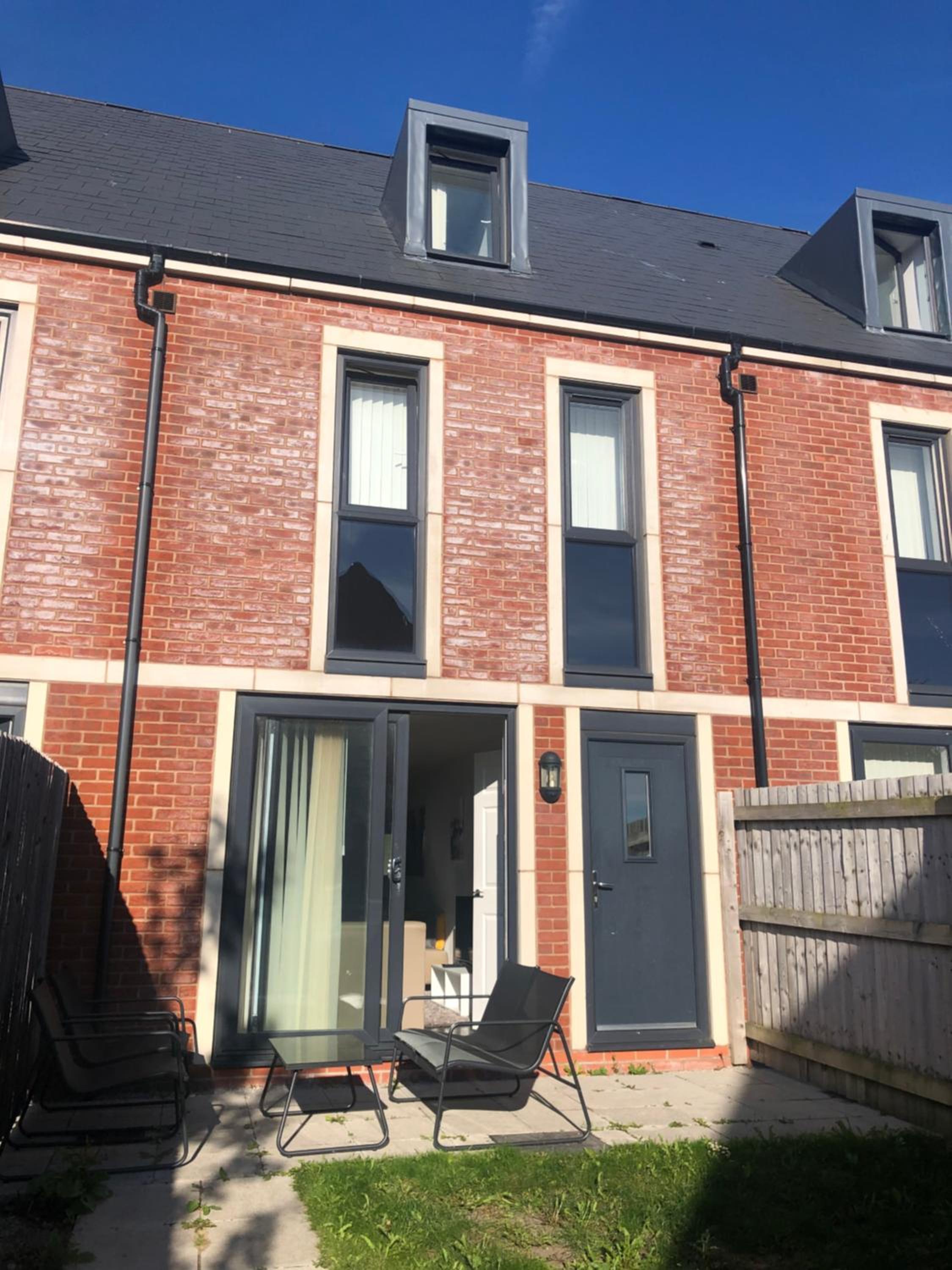 Four-Bedroom House - Photo 33