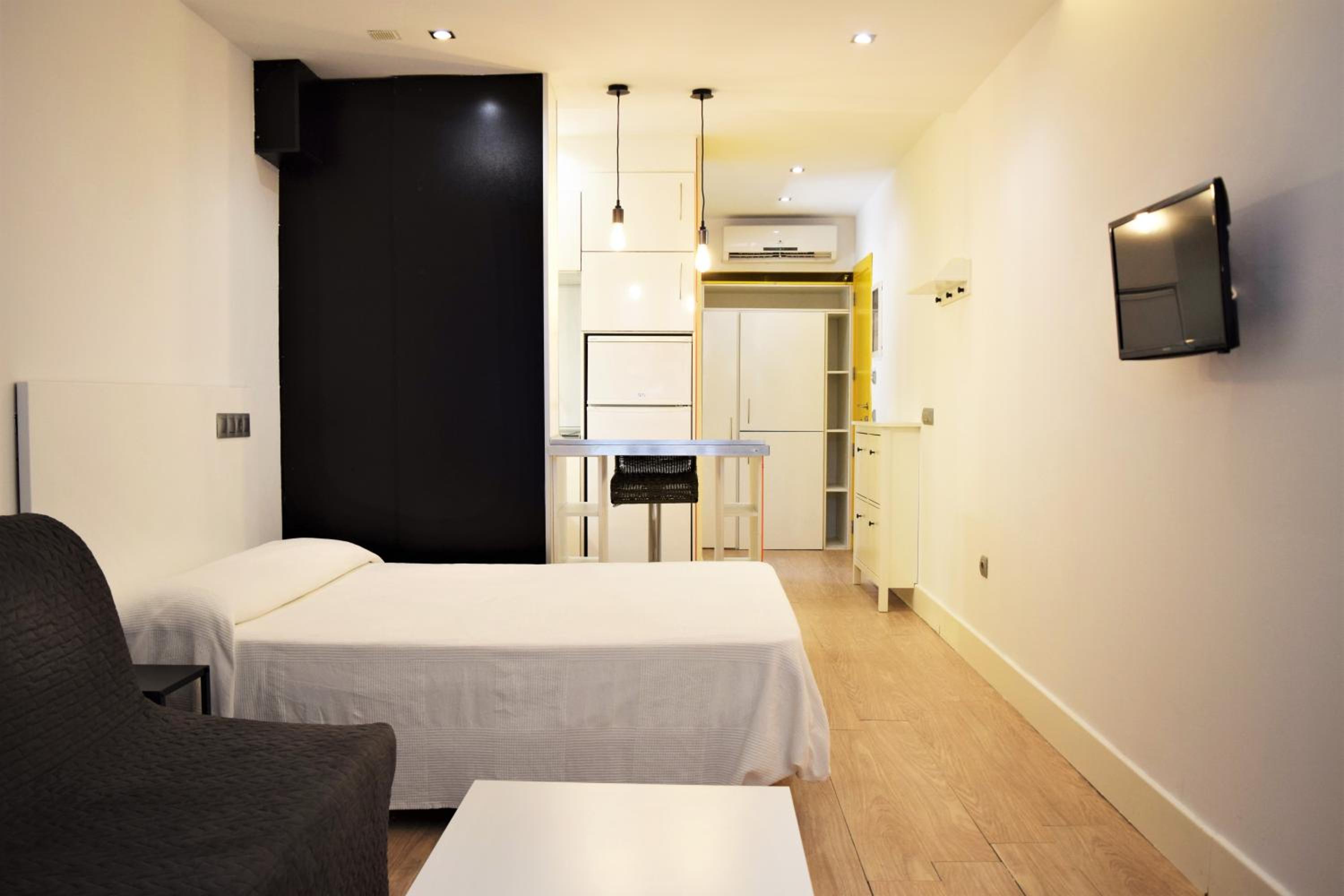 Estudio con sofá cama