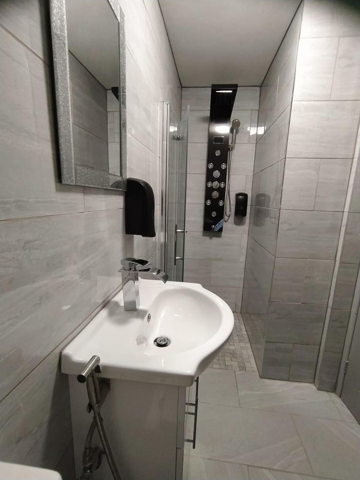 Three-Bedroom Apartment - Photo 21
