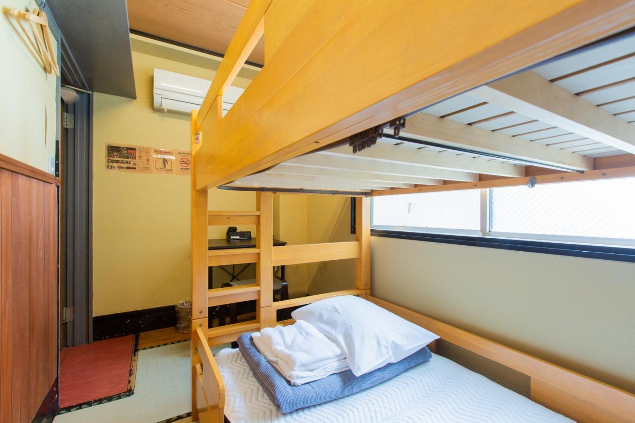 Single Bed in Male Dormitory Room with Shared Bathroom