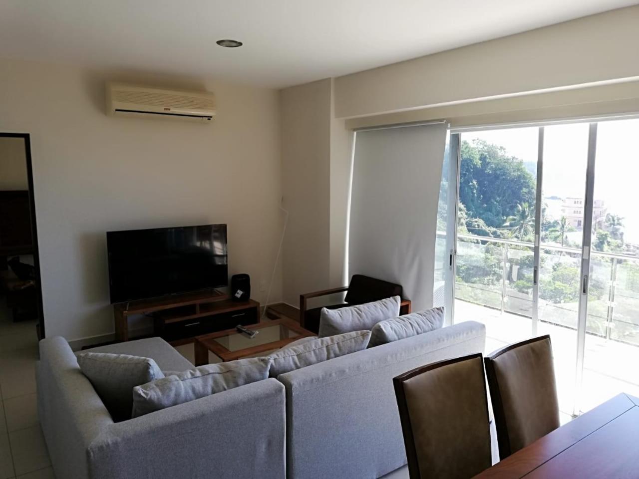 Three-Bedroom Apartment photo 1