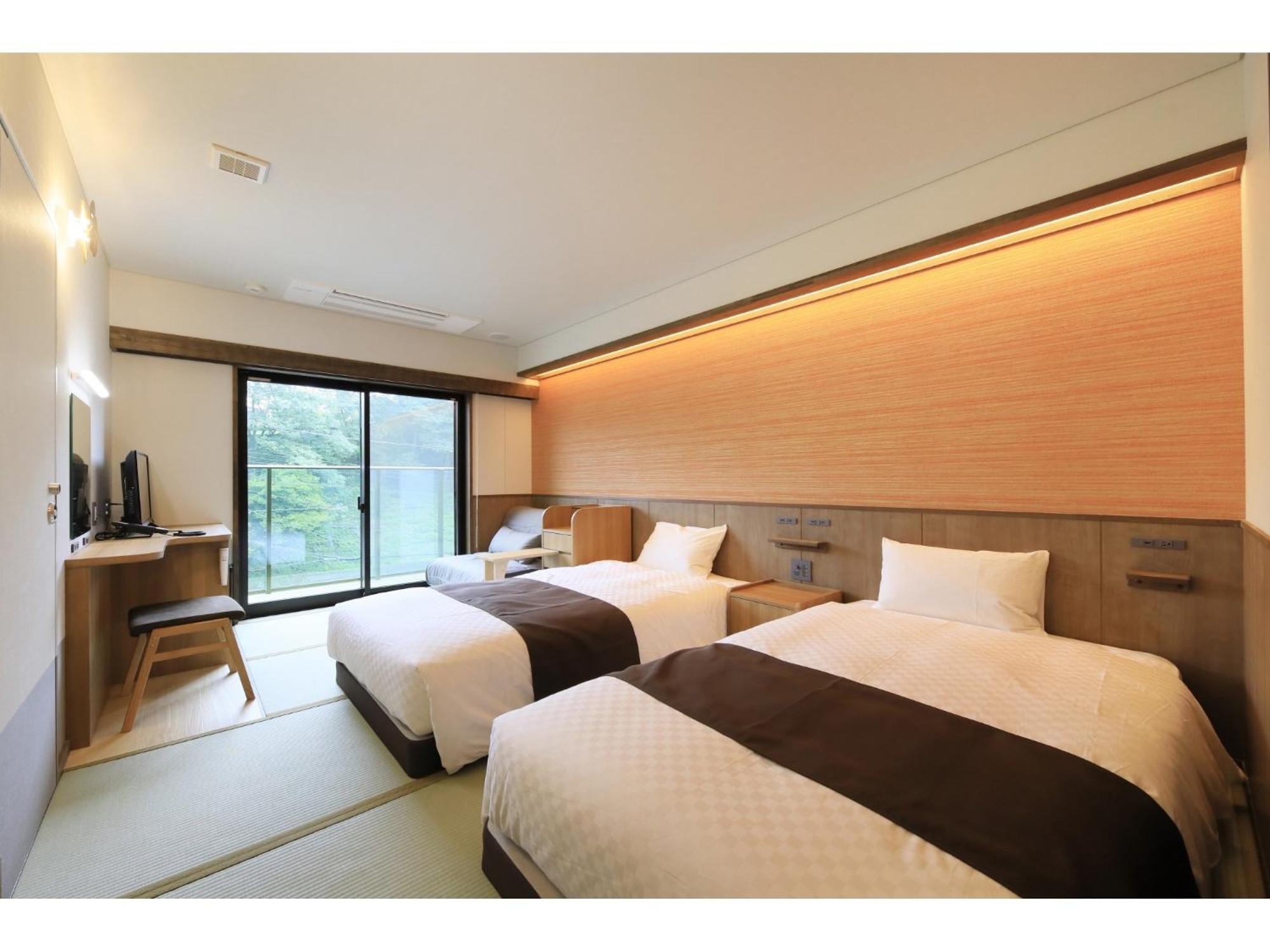 Twin Room - Photo 1
