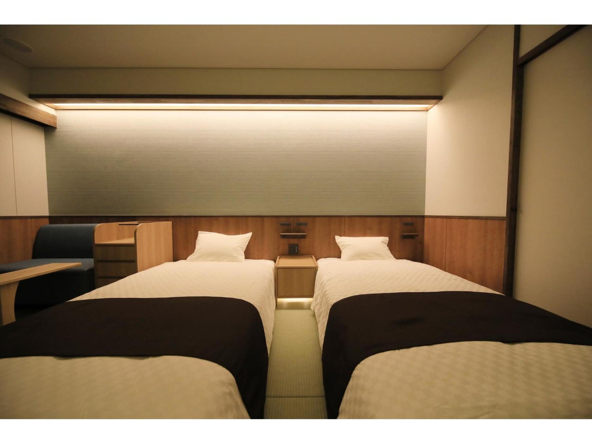 Twin Room - Photo 7