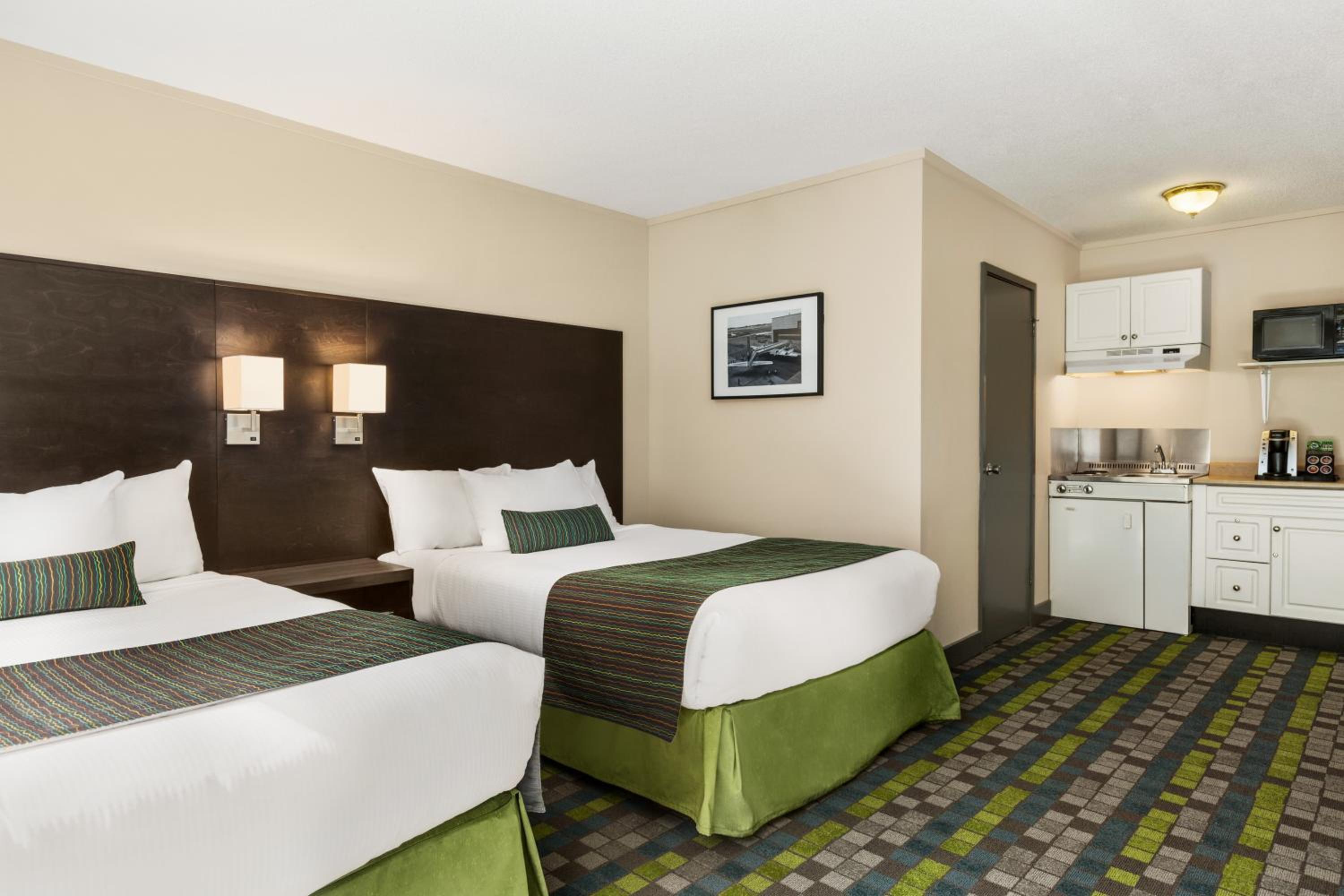 Deluxe Efficiency Room with Two Queen Beds, Non-Smoking - Photo 3