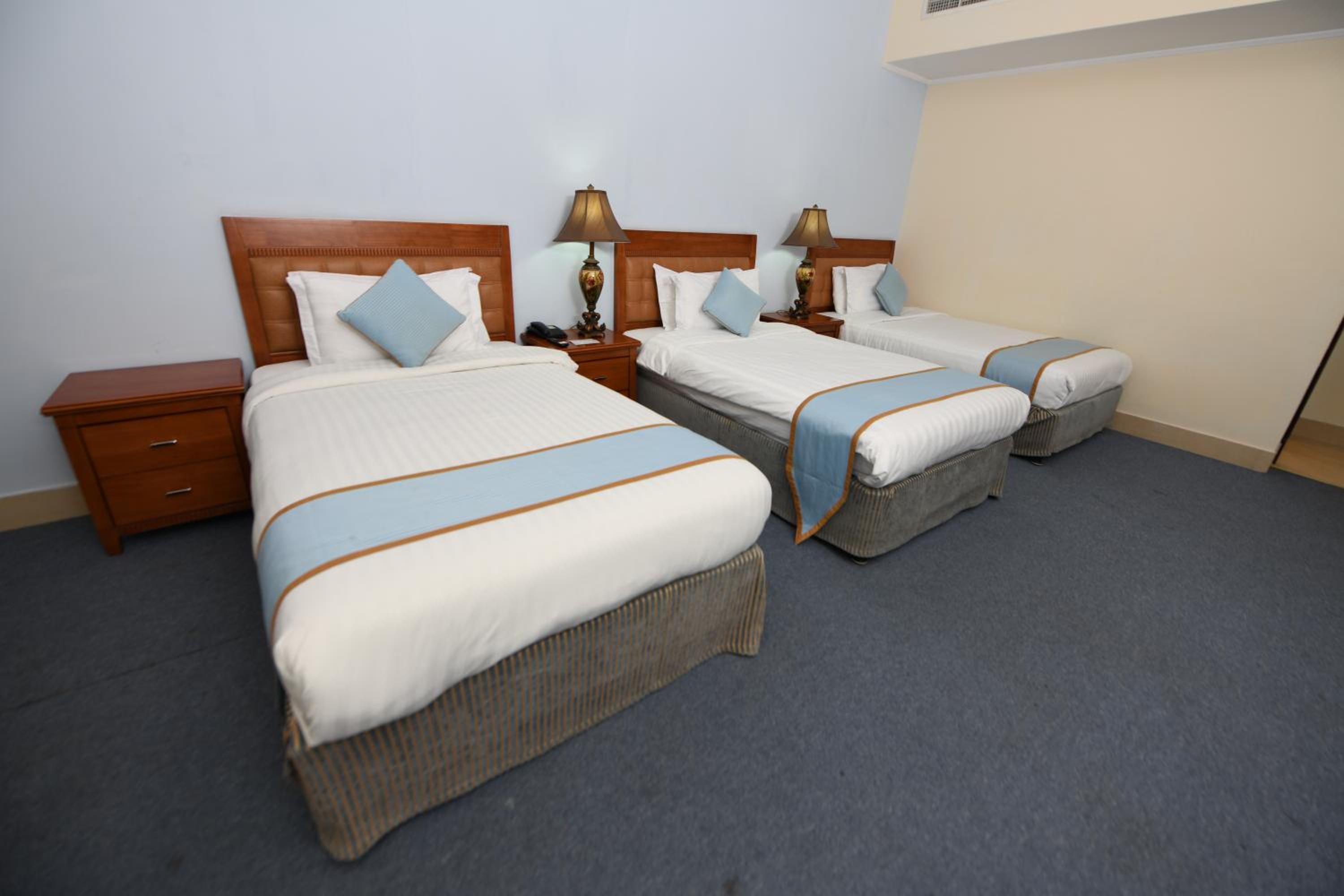 Deluxe Triple Room - Photo 1