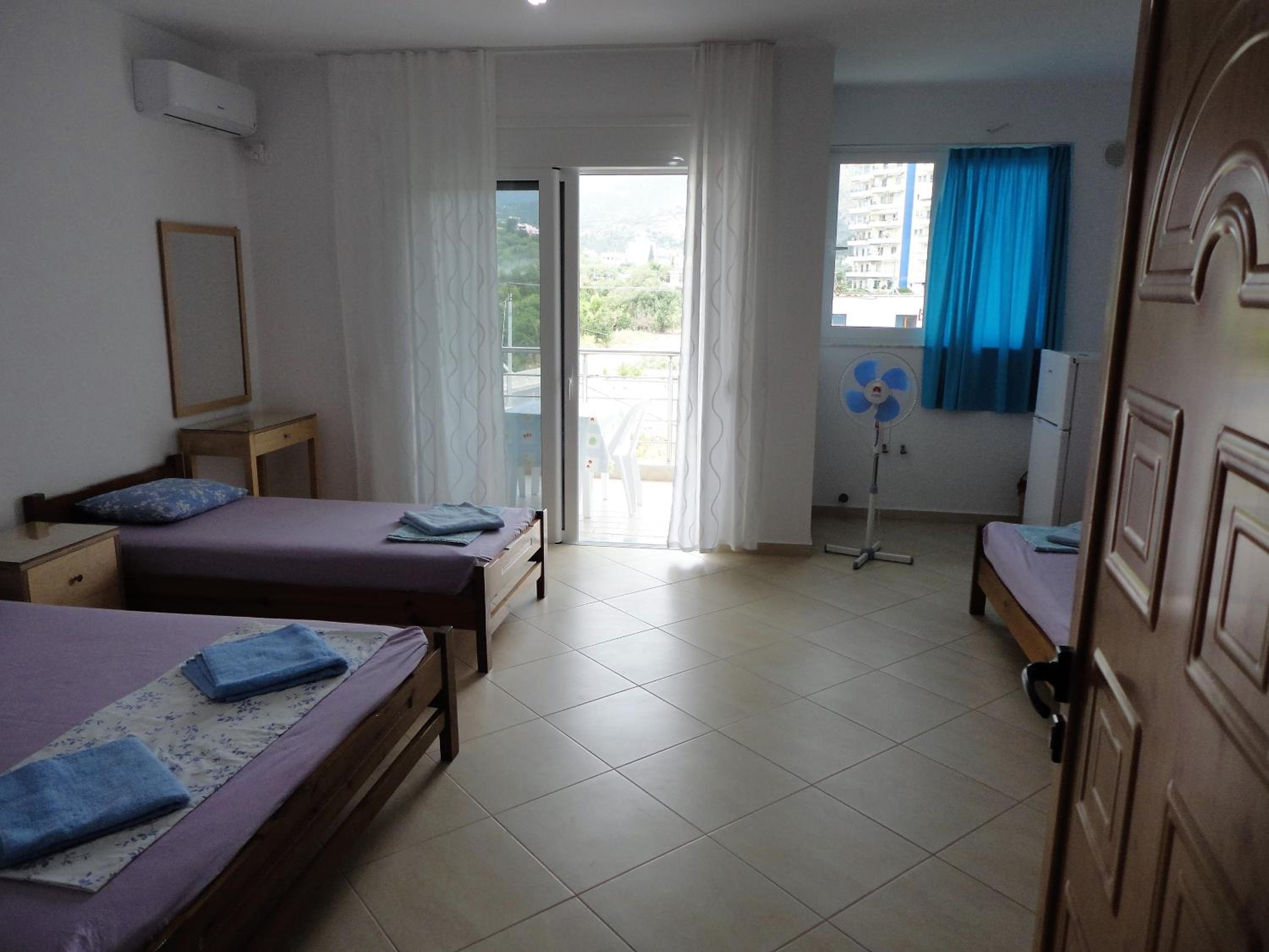 Comfort Quadruple Room with Balcony and Garden View
