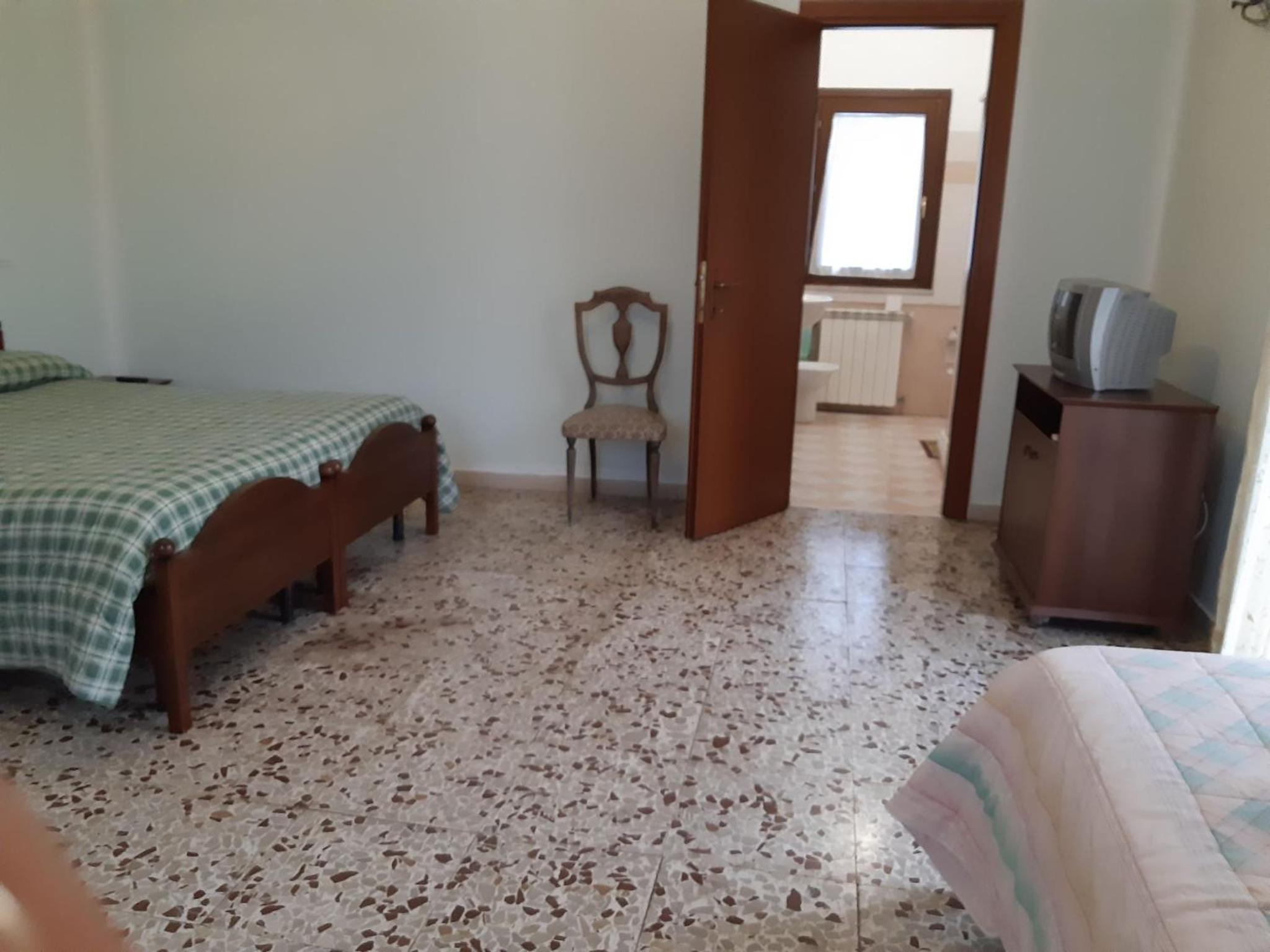 Quadruple Room with Private Bathroom photo 2