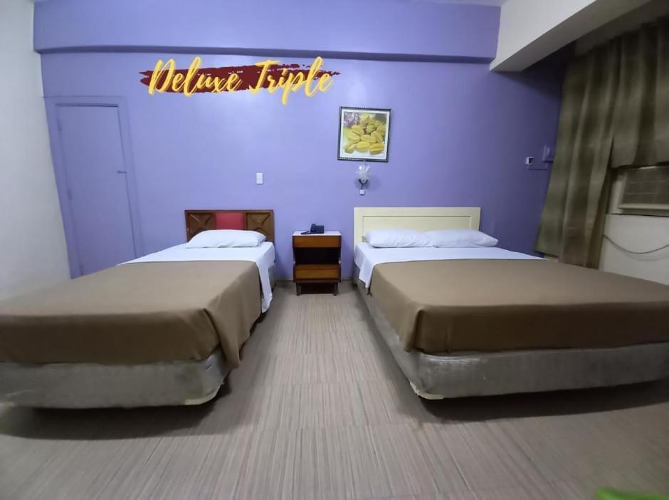 Deluxe Triple Room - Photo 2