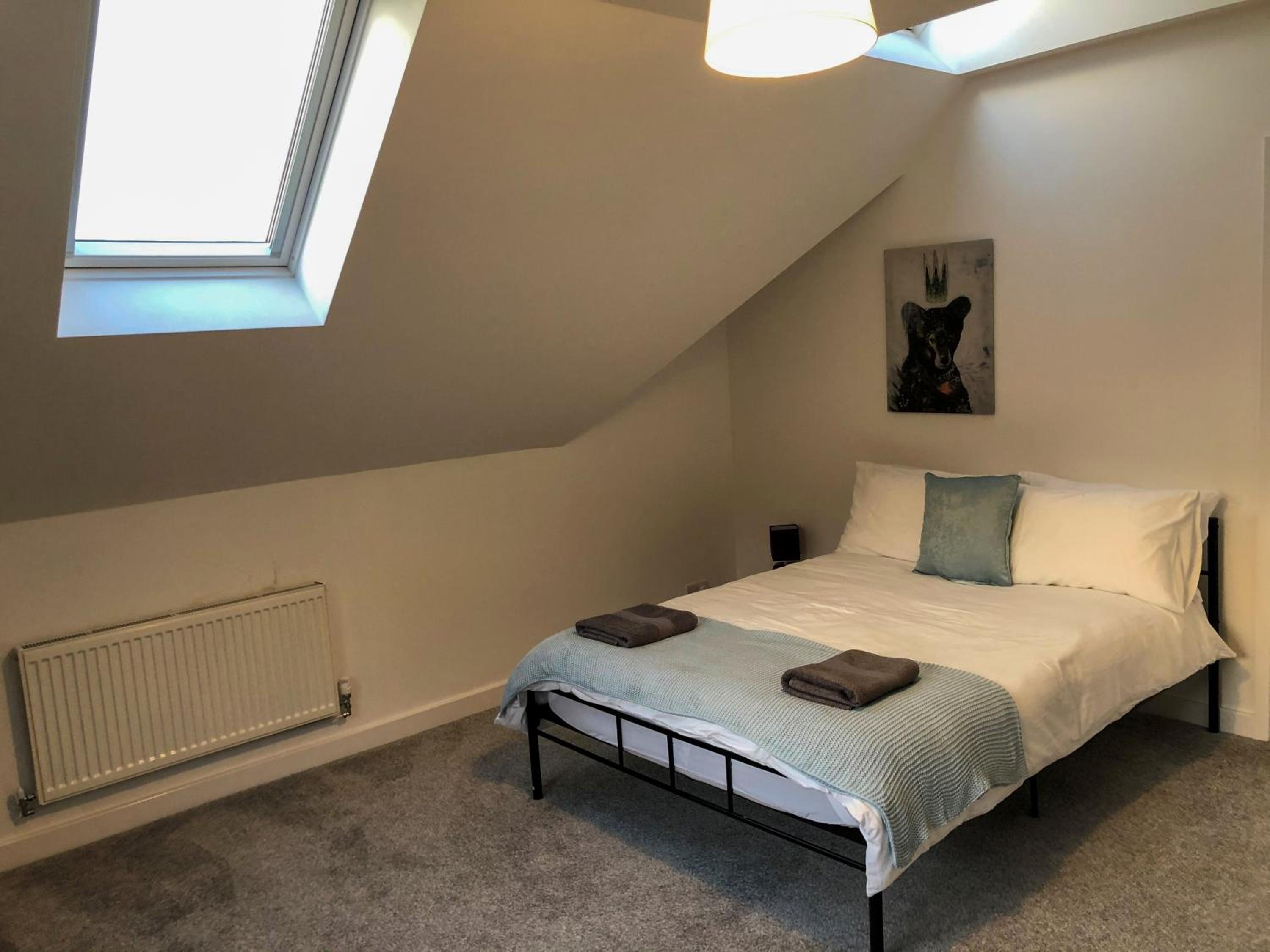 Three-Bedroom Apartment photo 2