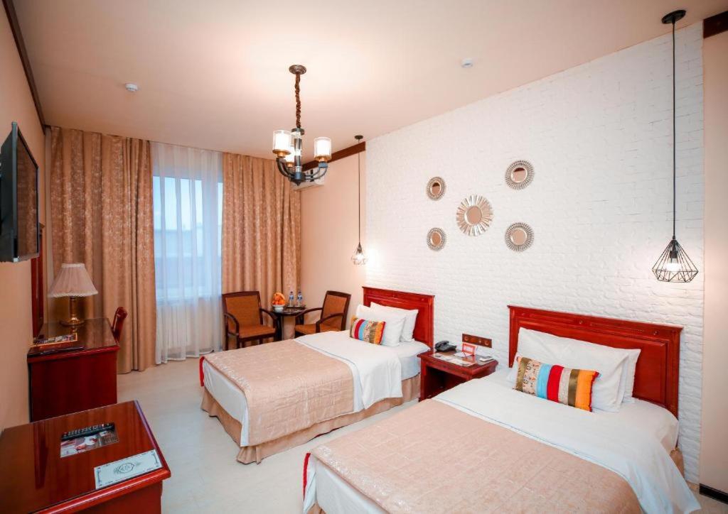 Standard Twin Room - Photo 3