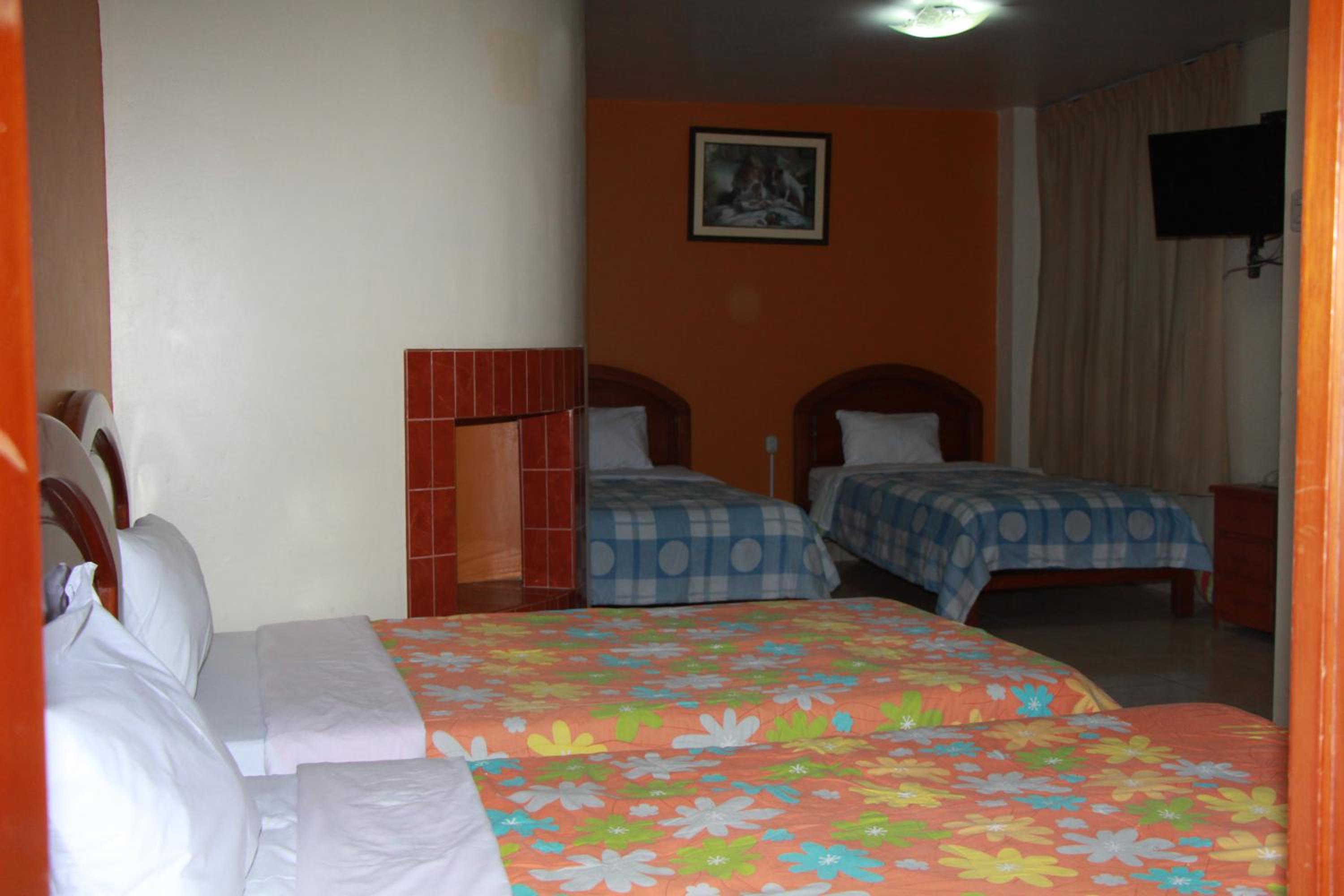Quadruple Room with Private Bathroom photo 1