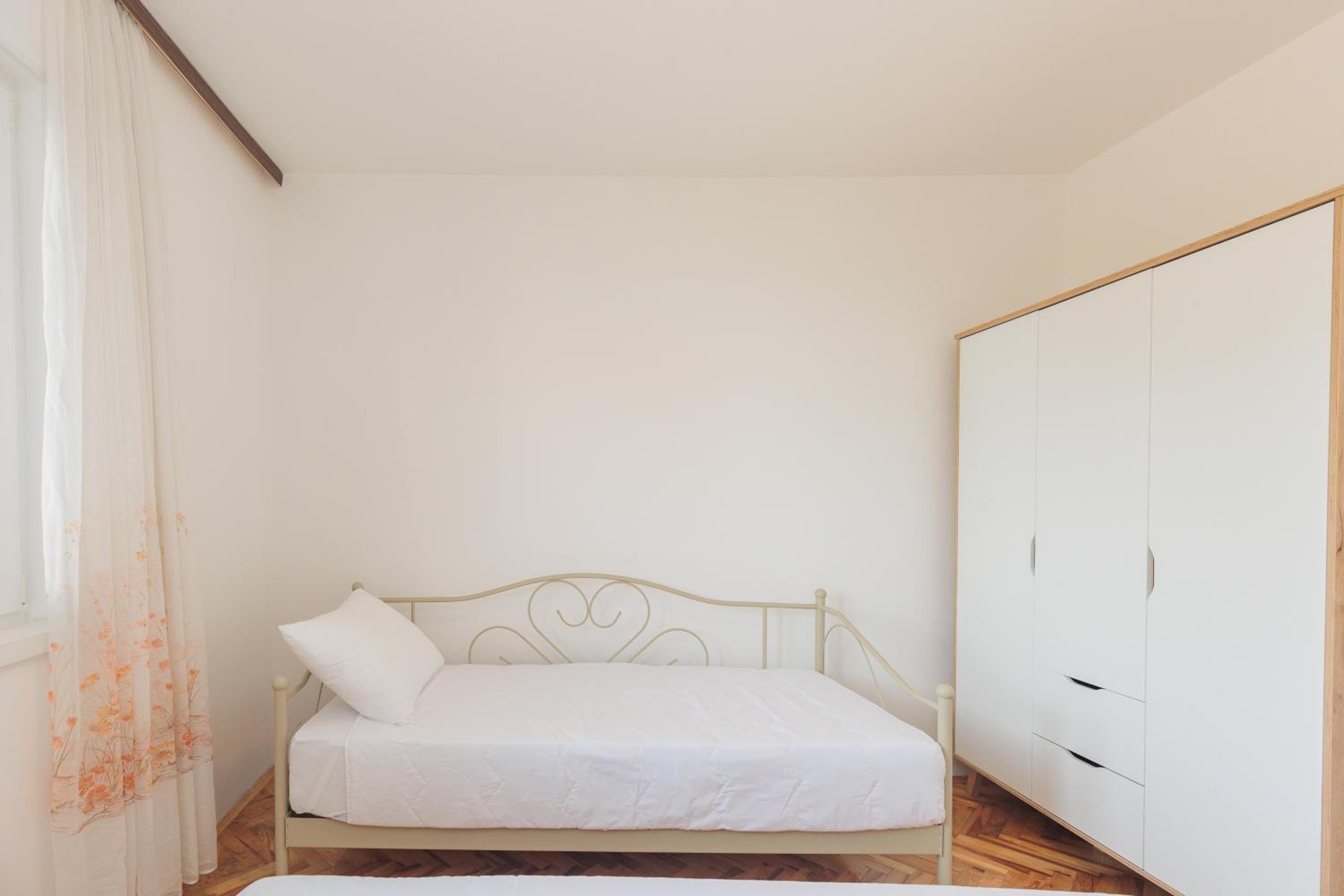 Three-Bedroom Apartment - Photo 1