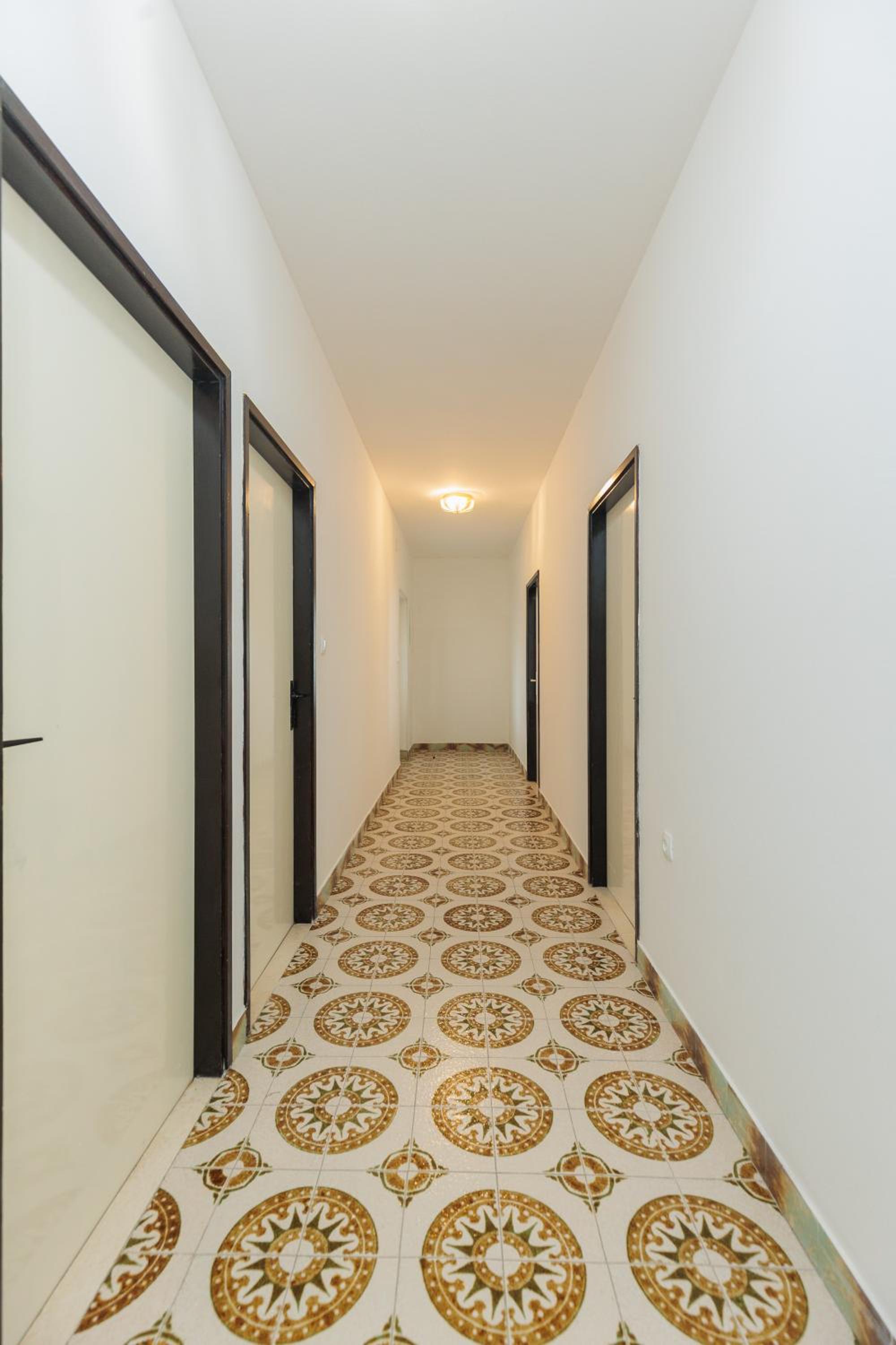 Three-Bedroom Apartment - Photo 32