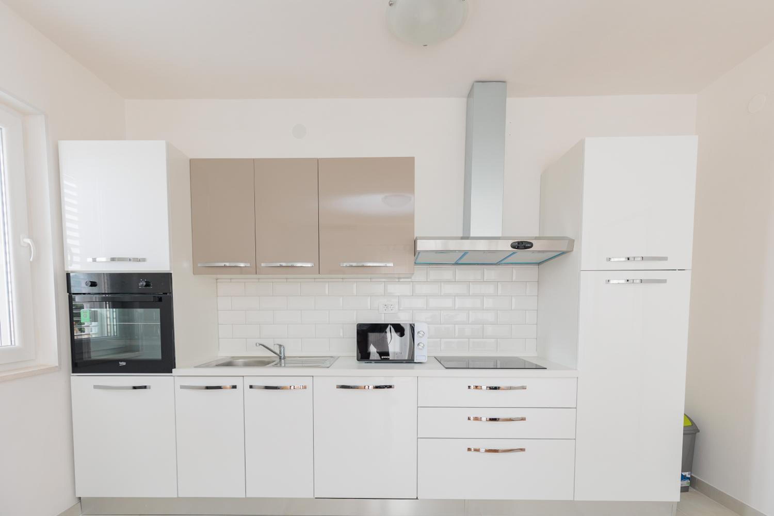 Three-Bedroom Apartment - Photo 34