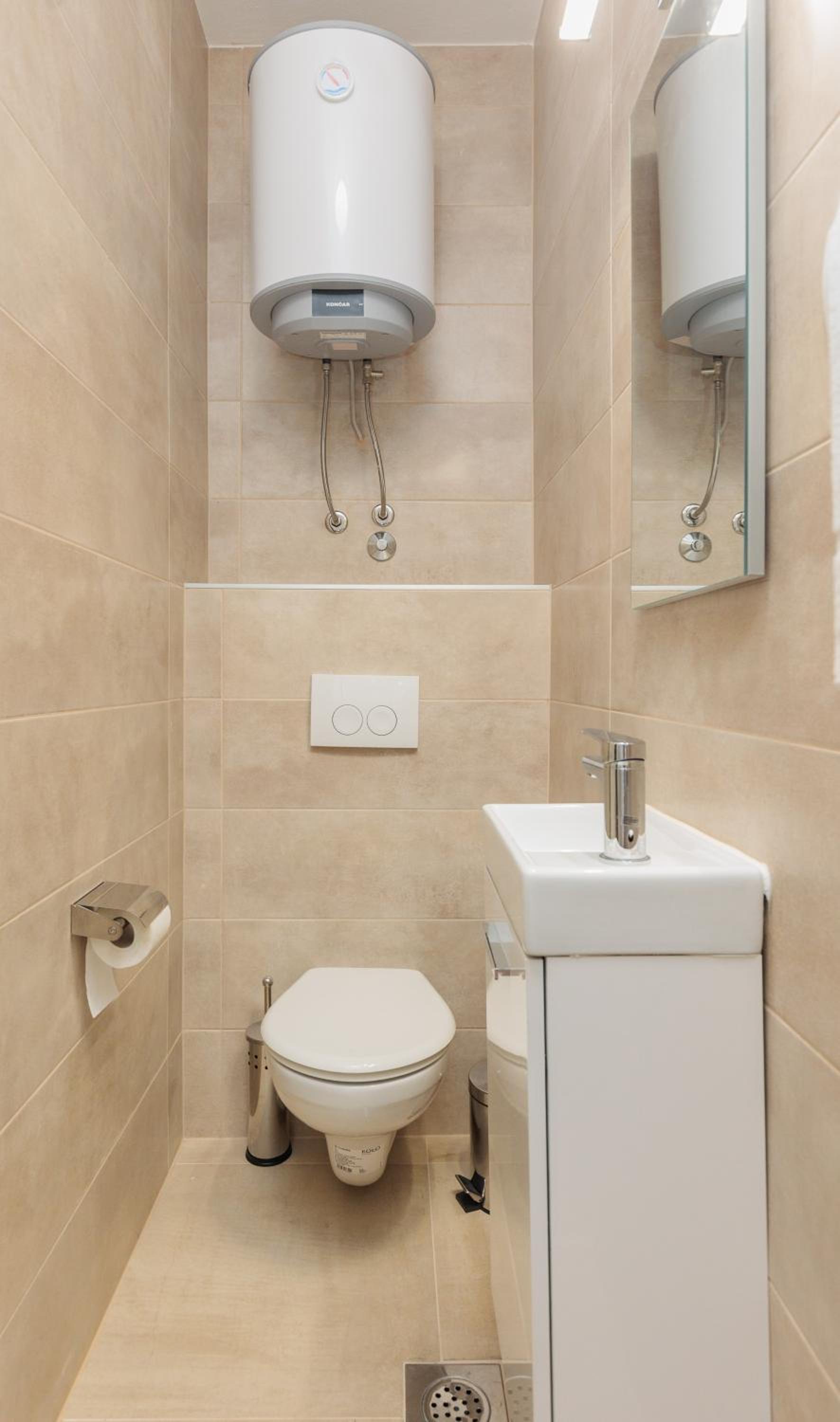 Three-Bedroom Apartment - Photo 37