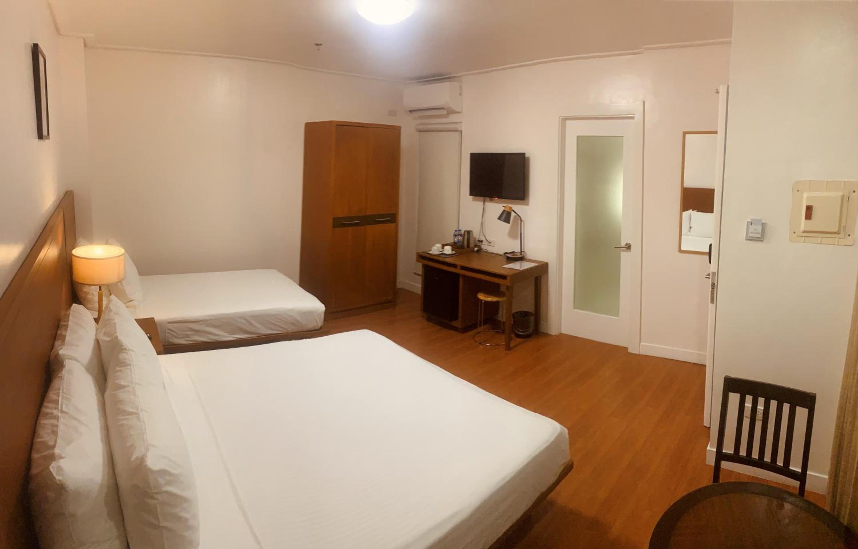 Deluxe Triple Room - Photo 2