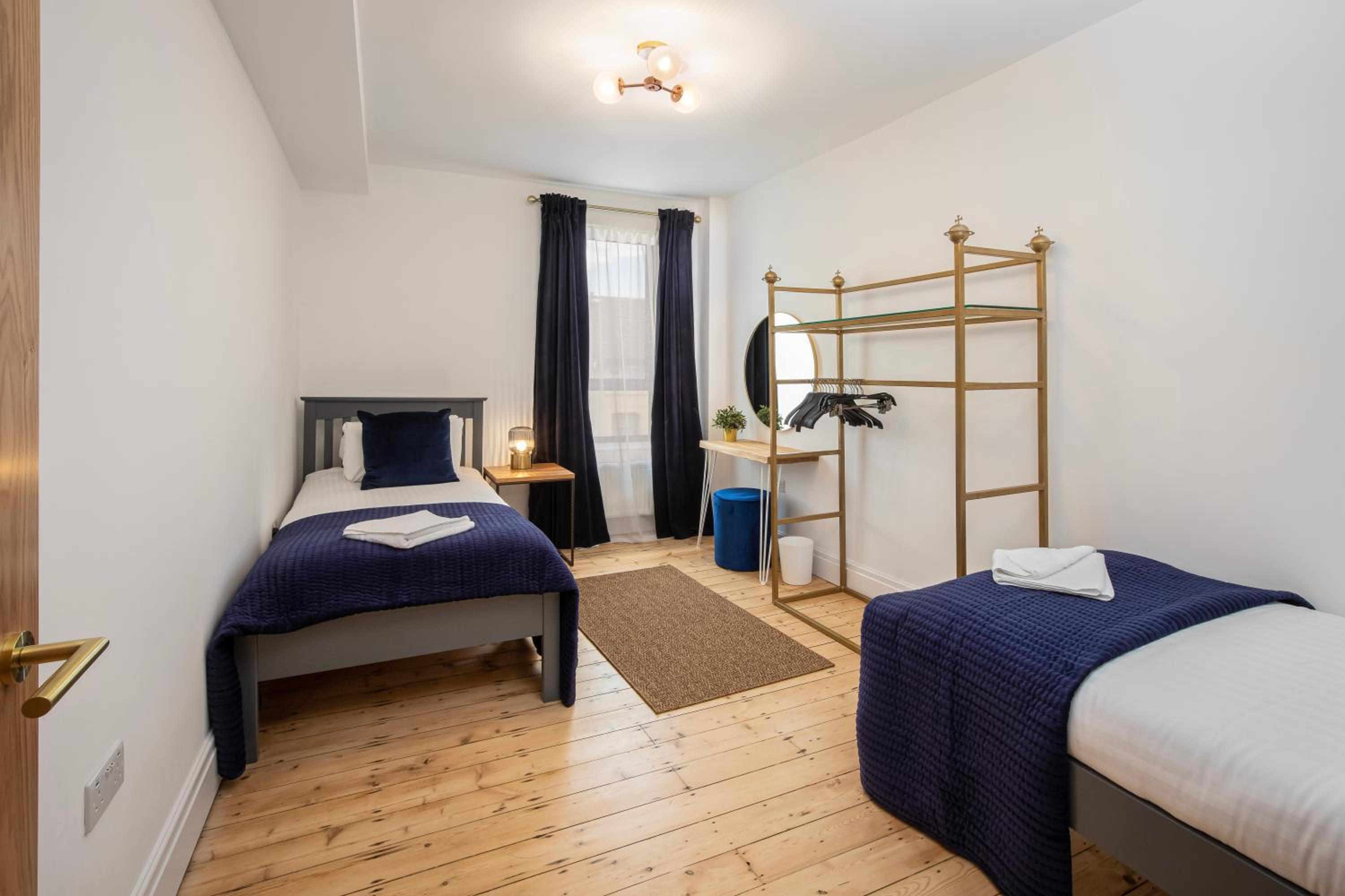 Three-Bedroom Apartment - Photo 2