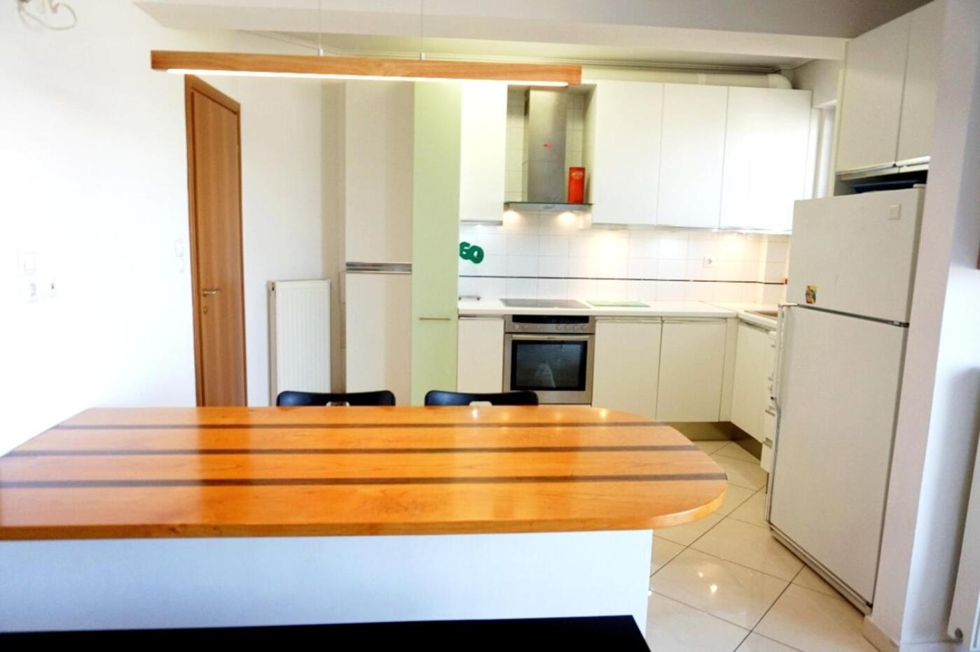 Apartment with Balcony - Photo 7