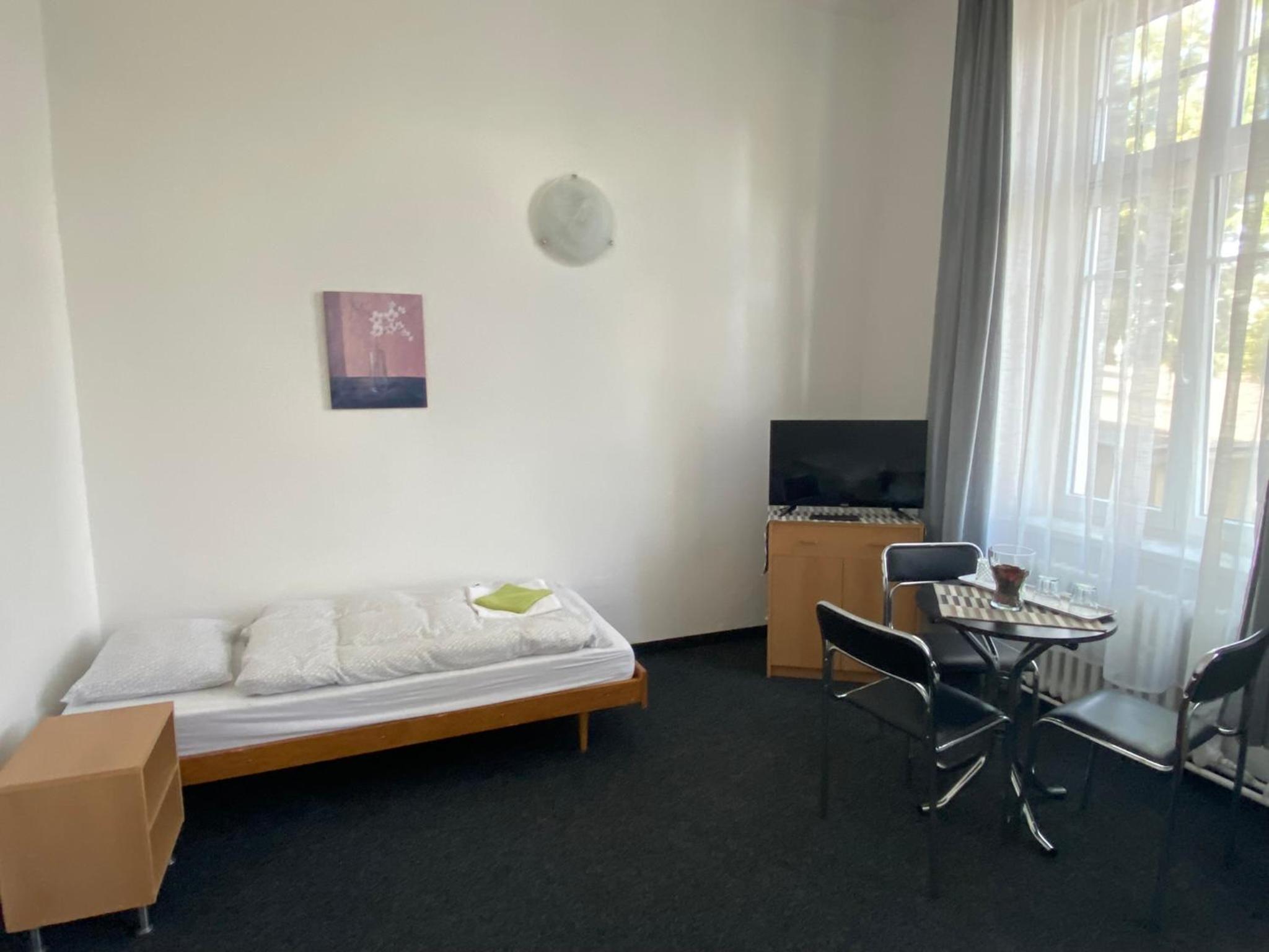 Quadruple Room with Private Bathroom photo 1